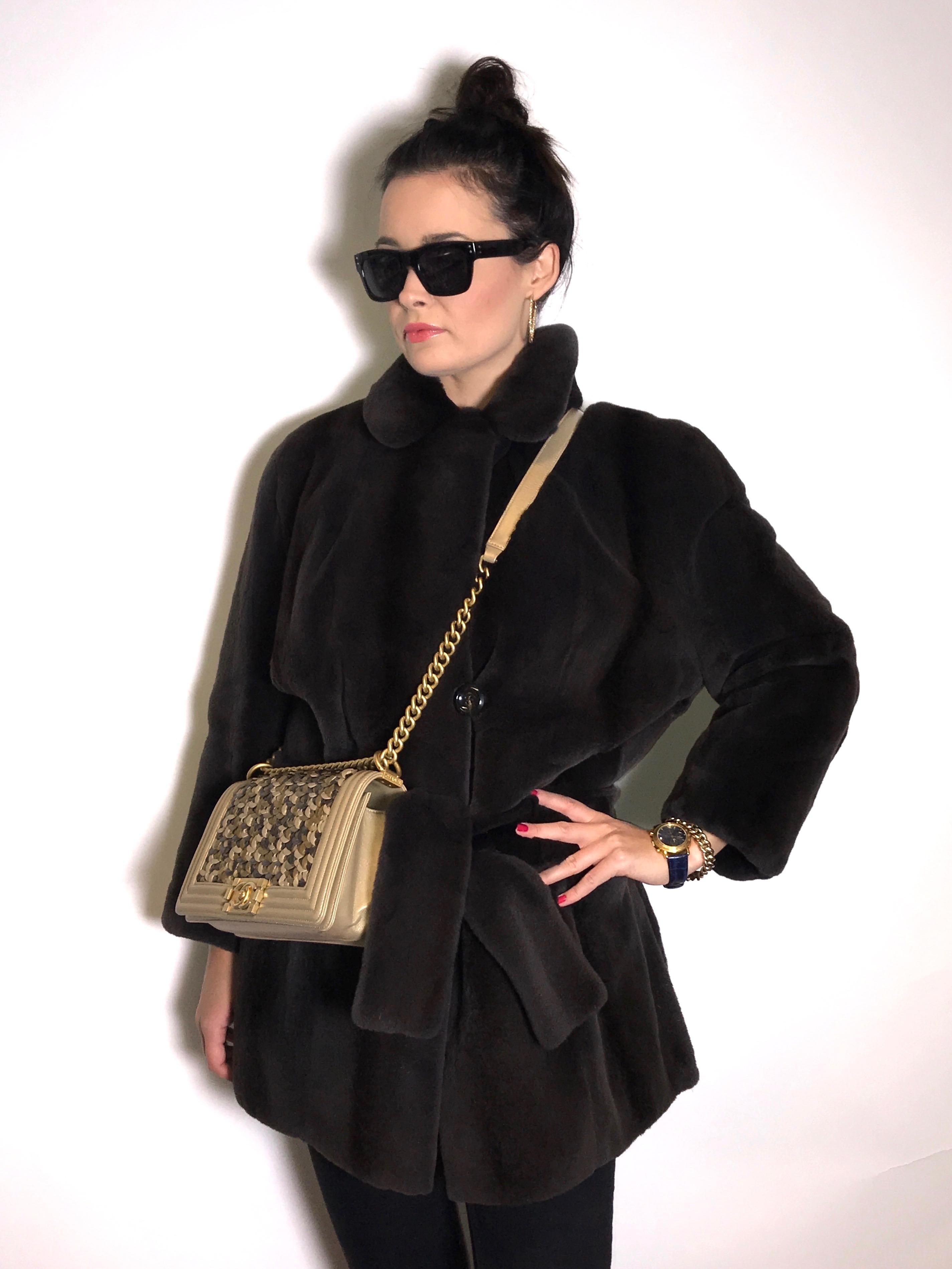 Unique sheared black silk mink jacket with belt.
Exclusively made by 