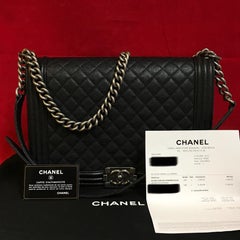 CHANEL Large Boy shoulder bag black quilted caviar / calfskin 2016