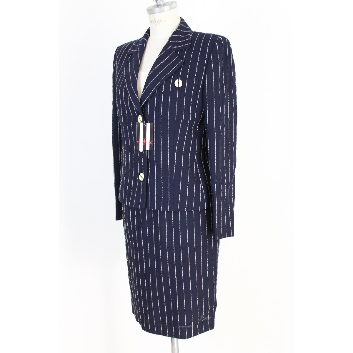 Valentino vintage 90s dress suit. Composed of a white and blue pinstripe sheath dress and a matching blue pinstripe jacket. Precious wool composition, fully lined. Elegant vintage evening dress, for formal events or ceremonies. Made in Italy, new