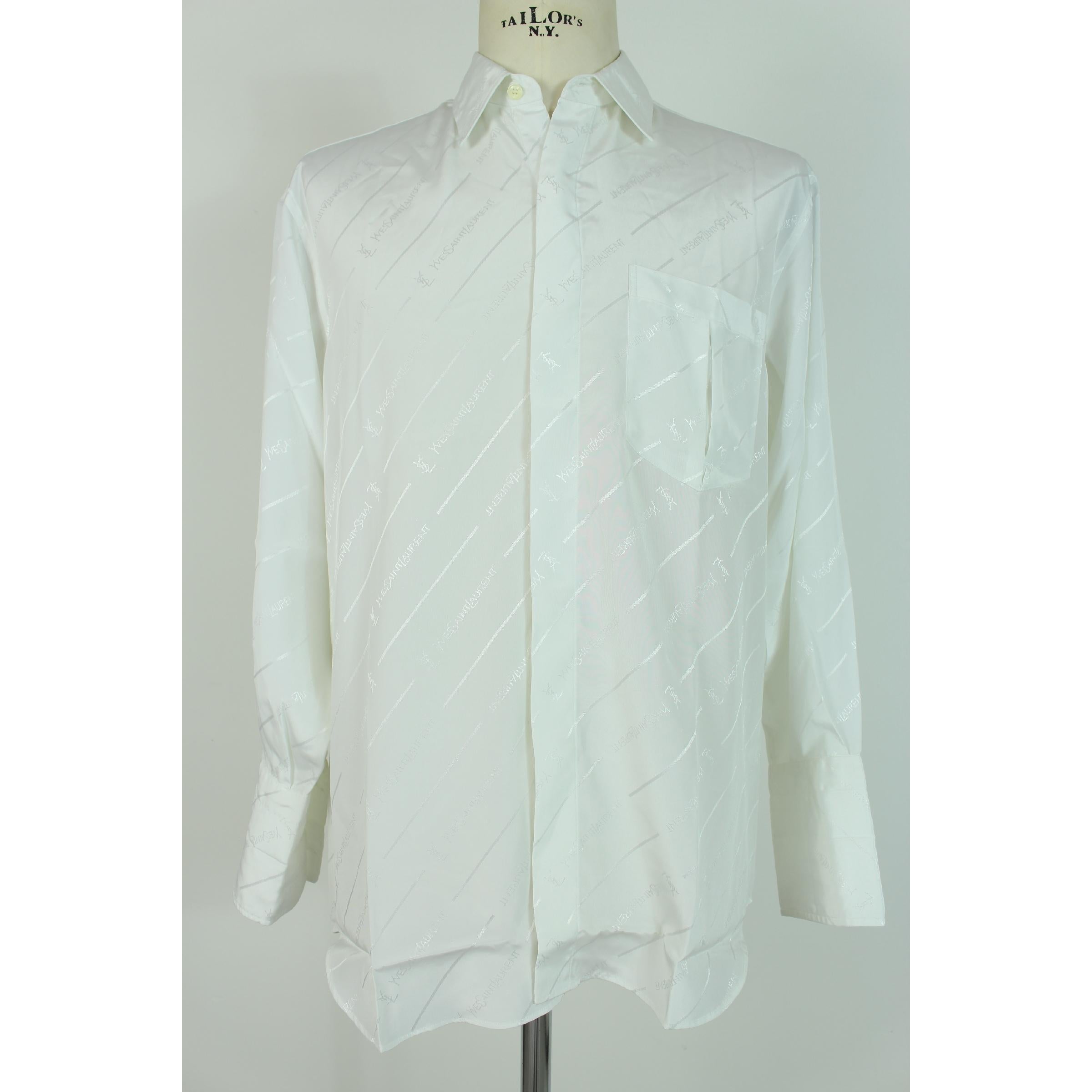 Yves Saint Laurent vintage men's shirt, white, 100% silk, cuffs with twin closure. Missing label. 1990s. Made in Italy. Excellent vintage conditions.

Size: 48 It 38 Us 38 Uk

Shoulder: 48 cm
Bust / Chest: 58 cm
Sleeve: 62 cm
Length: 80 cm