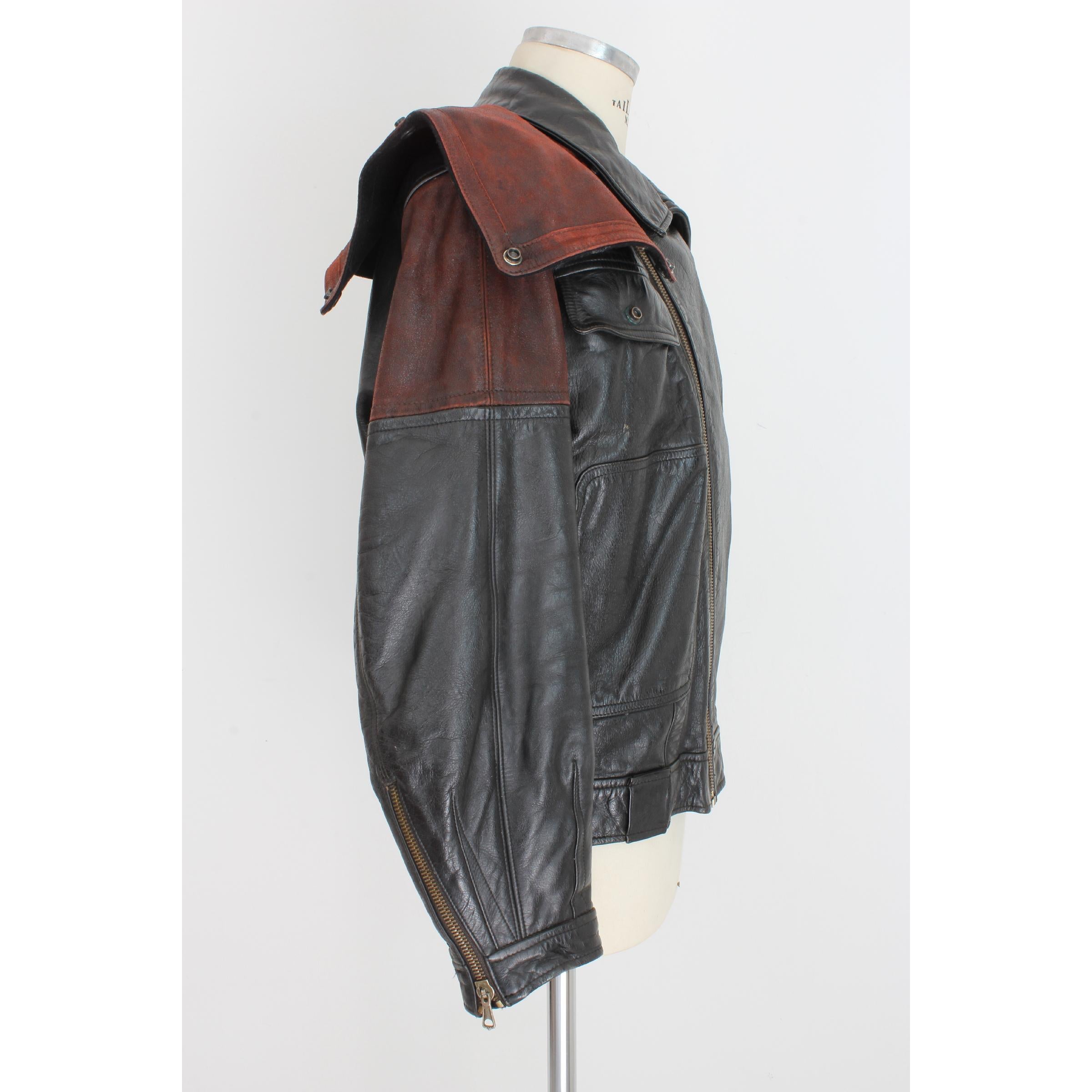 Emporio Armani vintage men's jacket, biker model, black, 100% leather, 1980s. The jacket has burgundy leather inserts and applied studs. Made in Italy. Very good vintage condition.
Size: 52 It 42 Us 42 Uk
Shoulder: 52 cm
Bust / Chest: 58 cm
Sleeve: