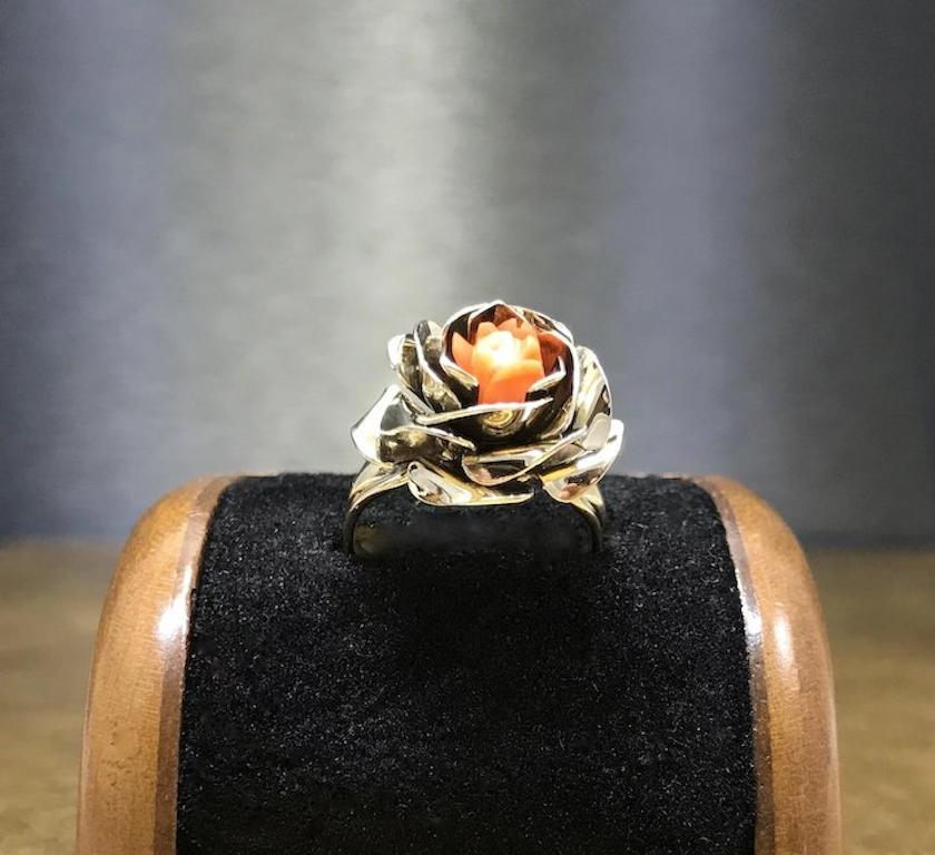 This vintage flower ring is crafted with gilded - vermeil - gold washed sterling silver and features a genuine coral center carved into he shape of a rose. This sterling rose ring would make a unique promise ring and a wonderful birthday gift,