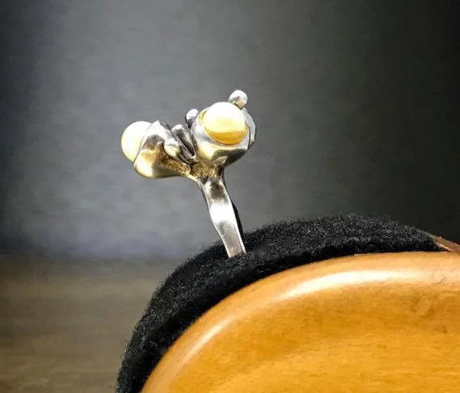 This pearl minimalist ring crafted with 925 sterling silver features genuine cultured pearls and an interesting Mid Century - Minimalist - aquatic - sea life design from the 1960s. This artisan crafted ring would make an Mother's Day gift, excellent