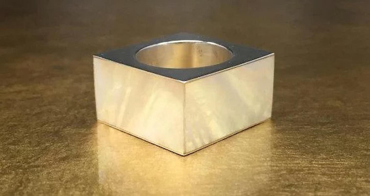 This unique geometric ring is crafted with 925 sterling silver and features beautiful white iridescent mother of pearl shell panels and a unique square late Mid Century Modern - Modernist - Minimalist - Mod design. This vintage square ring would