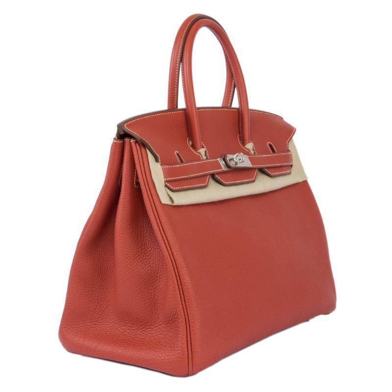 Hermes 'Birkin 35' in Sanguine (red) Veau Togo leather. Lined in Chevre (goat skin) with an open pcoket against the front and a zipper pocket against the back. Brand new. Comes with keys, lock, clochette, dust bag, box and rain kit.

Height 35cm