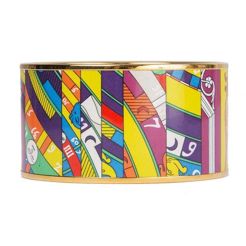 Hermès 'XL Astrologie Nouvelle' extra wide bangle in printed enamel with gold plated hardware. Brand new. Comes with box and dust bag.

Size 65
Width 3.5cm (1.4in)
Circumference 19.4cm (7.6in)