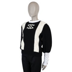 Maglione CHANEL in cashmere nero cremoso 21A CHATEAU DES DAMES a trecce, taglia 36 XS