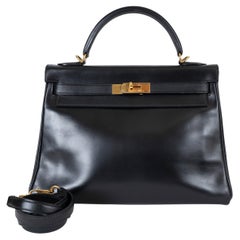 Bolso KELLY 32 RETOURNE de HERMES, de piel negra, modelo «Black Box», GHW