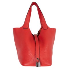 Bolso PICOTIN 18 LOCK de HERMES, en piel Clemence roja «Rouge Tomate», PHW