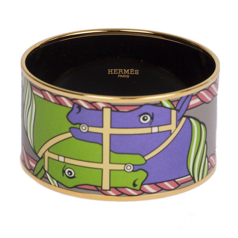 Hermès 'XL Quadrige Bangle' extra wide bangle in printed enamel with gold plated hardware. Brand new. Comes with box and dust bag.

Size 70mm
Width 4cm (1.6in)
Circumference 20.5cm (8in)