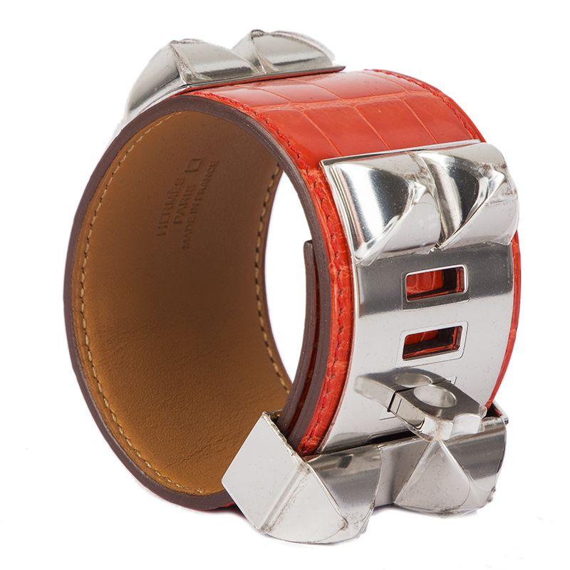 Hermes 'Collier de Chien' bracelet in Rouge Indien crocodile with Palladium hardware. Brand new. Comes with box.

Size S
Width 4cm (1.6in)
Fits 17cm (6.6in) to 19cm (7.4in)
