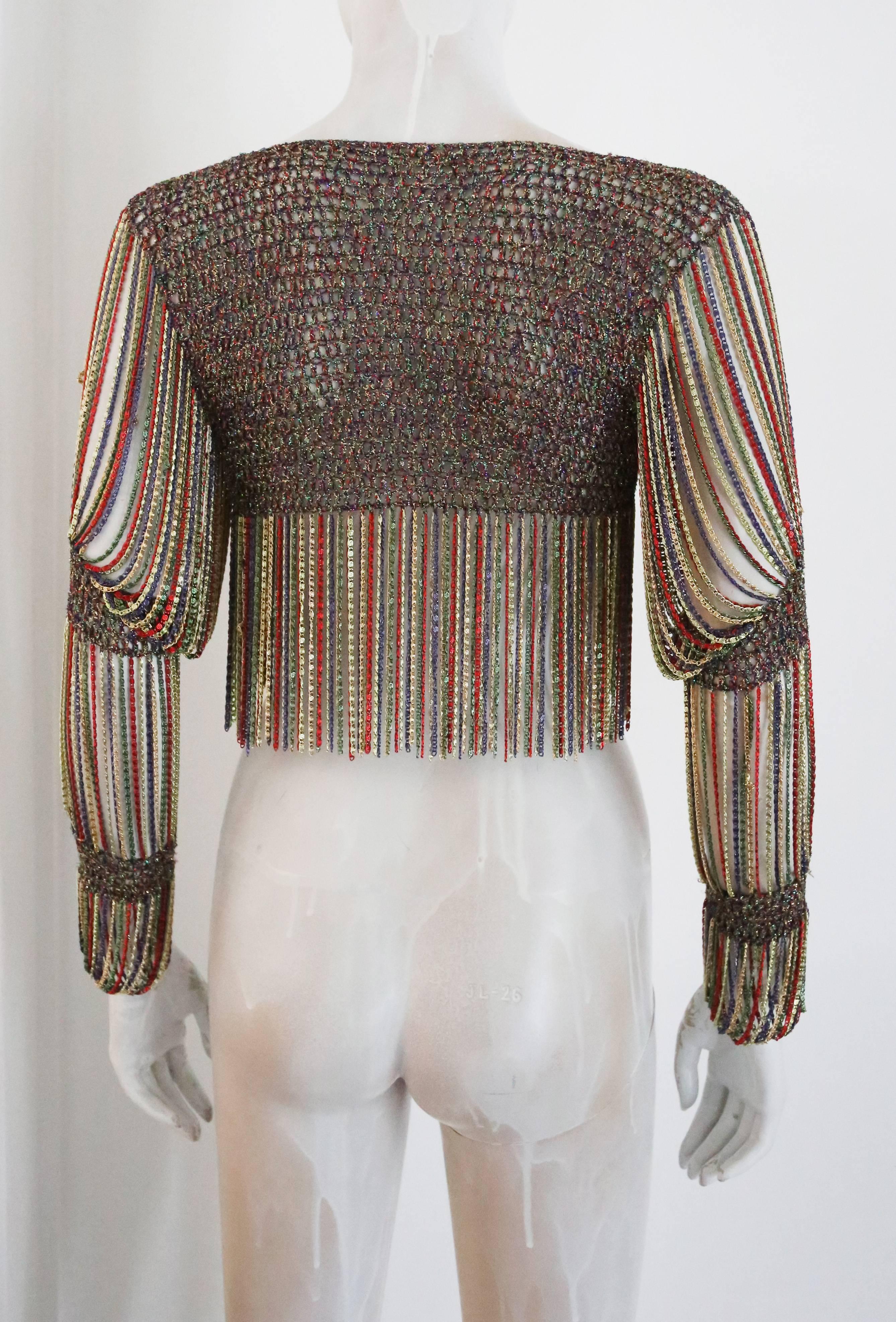 Brown Loris Azzaro knitted cropped cardigan with chain mail sleeves and trim, c. 1970s