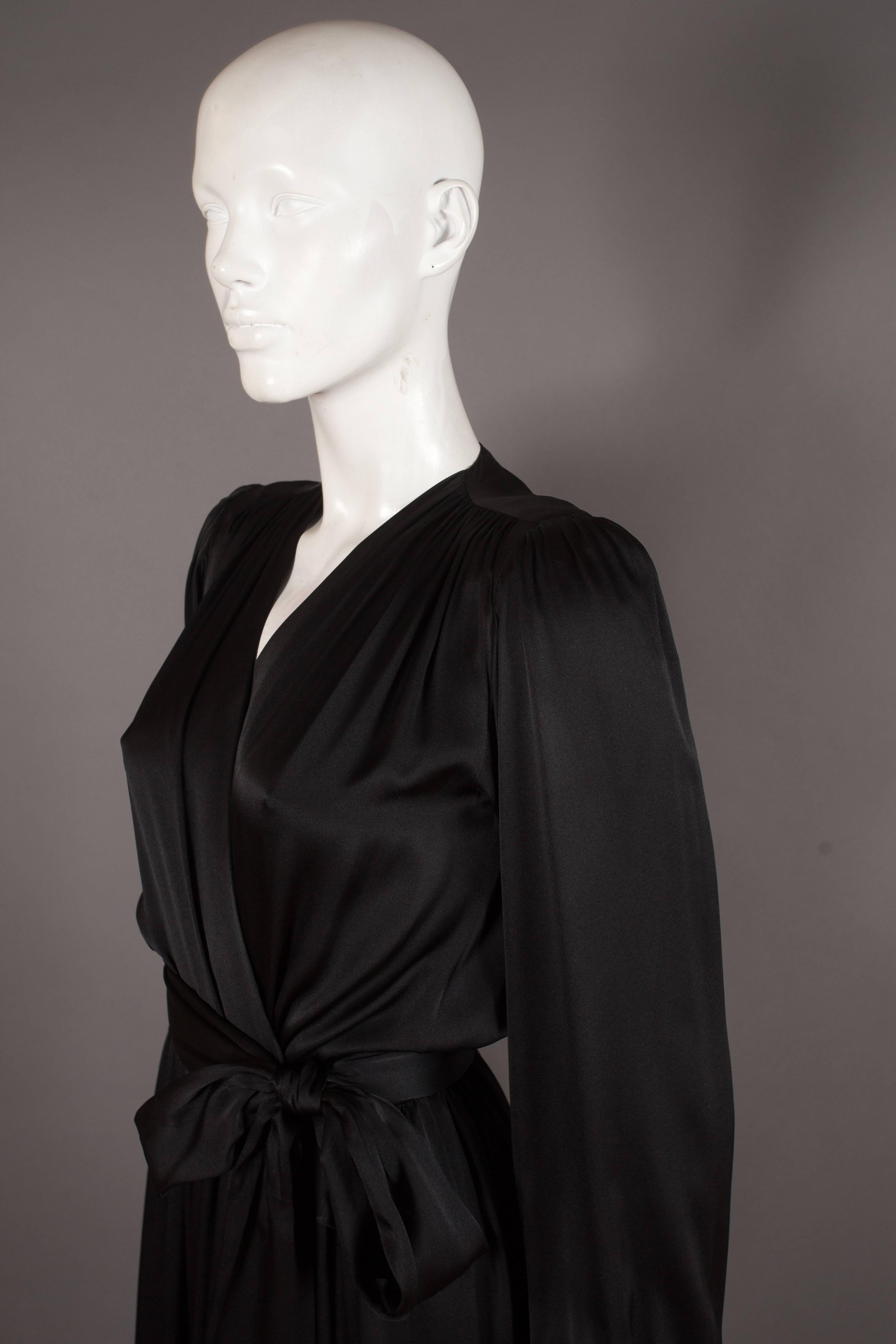 Black Yves Saint Laurent silk evening wrap dress, circa 1985
