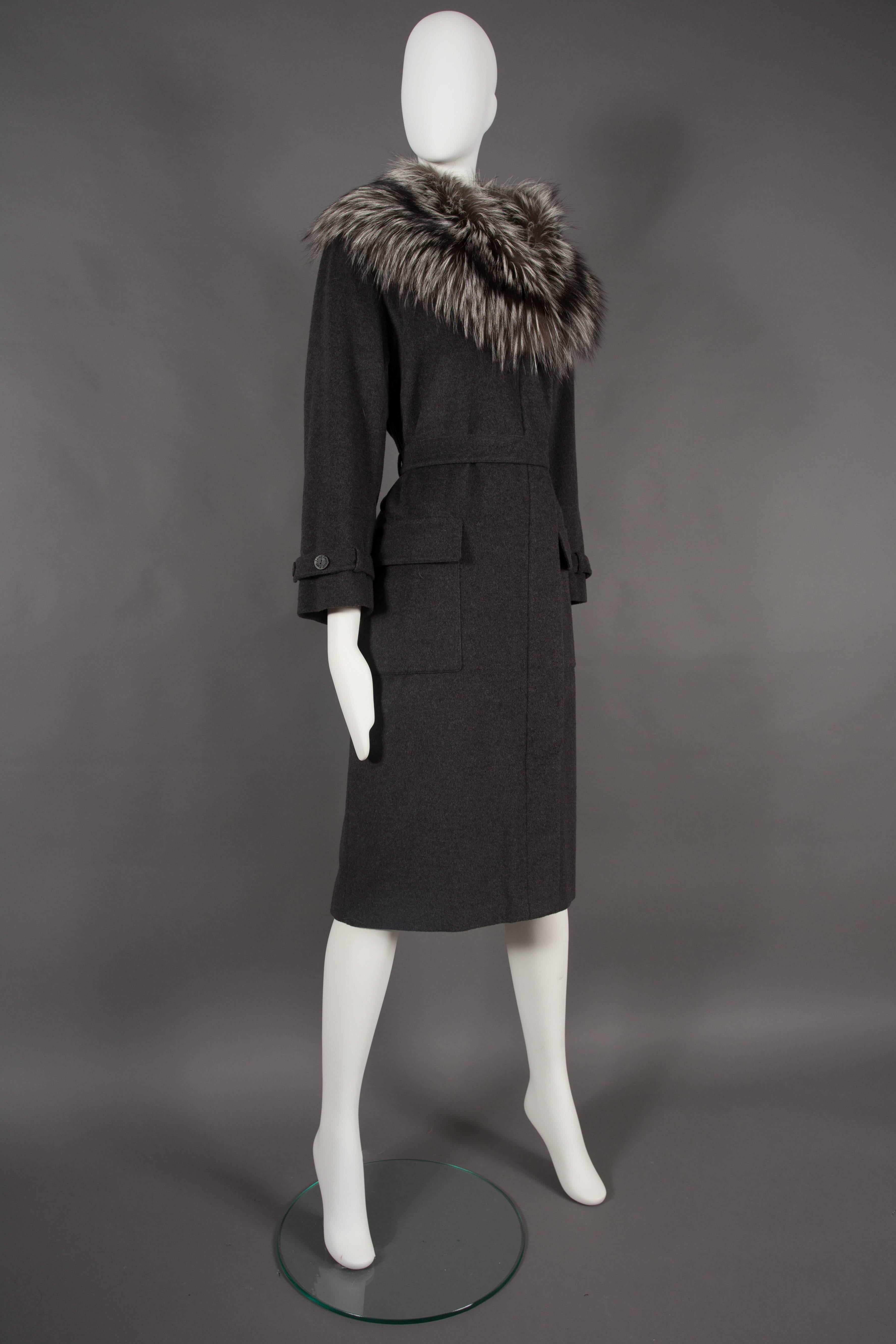 Black Yves Saint Laurent cashmere fall coat with fox fur collar, circa 1990