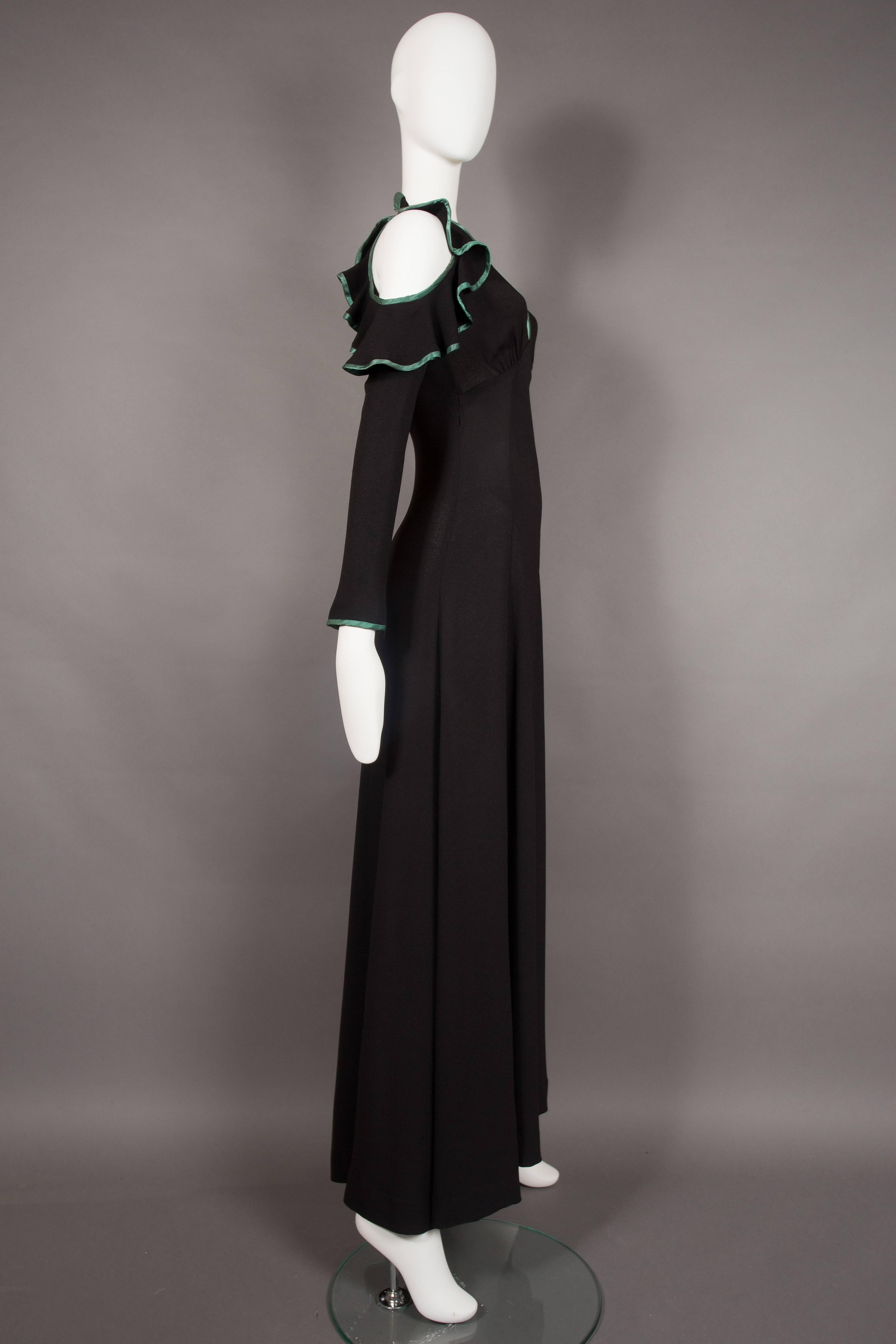 Black Ossie Clark black cold shoulder evening dress with green satin trim, circa 1968