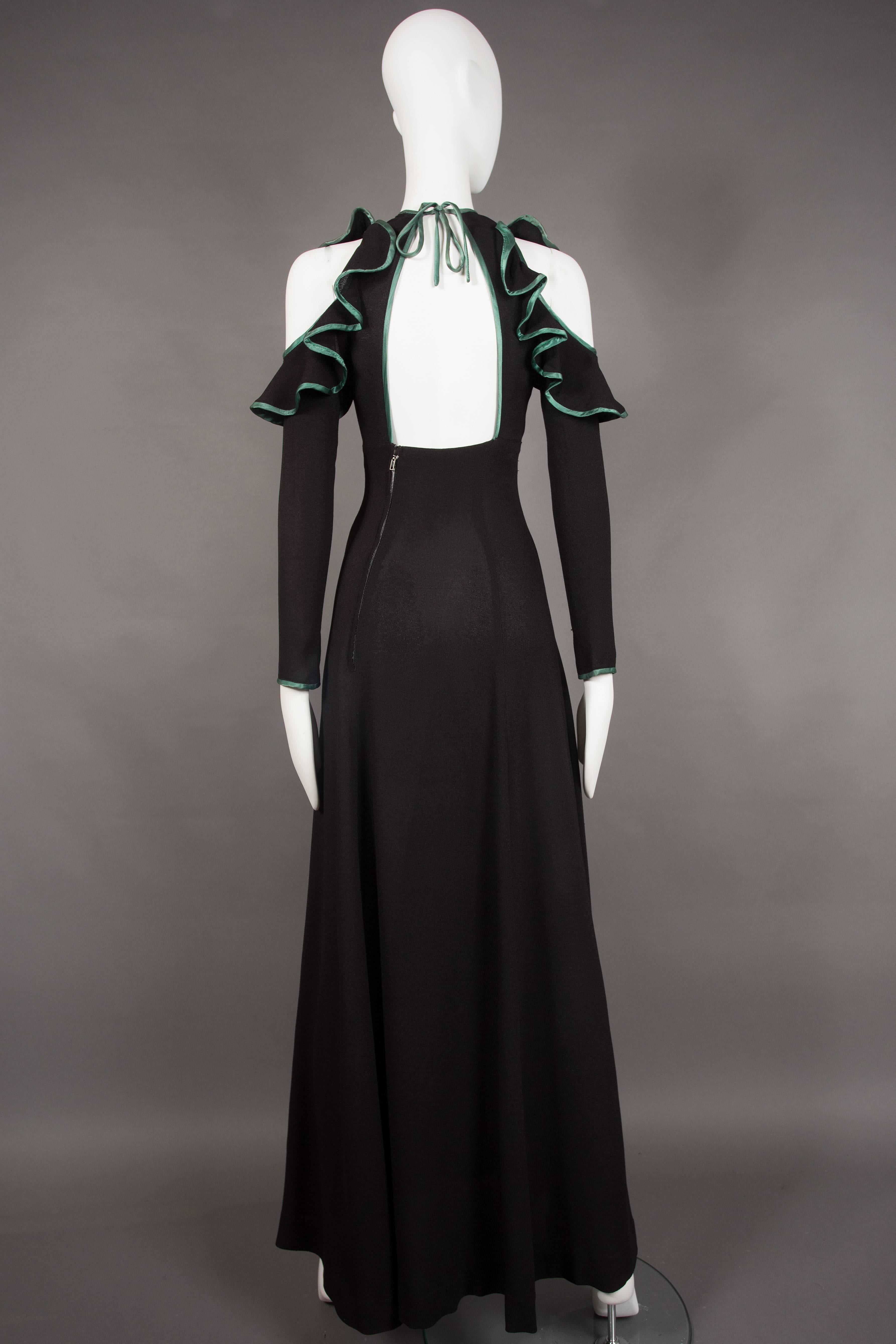 Women's Ossie Clark black cold shoulder evening dress with green satin trim, circa 1968