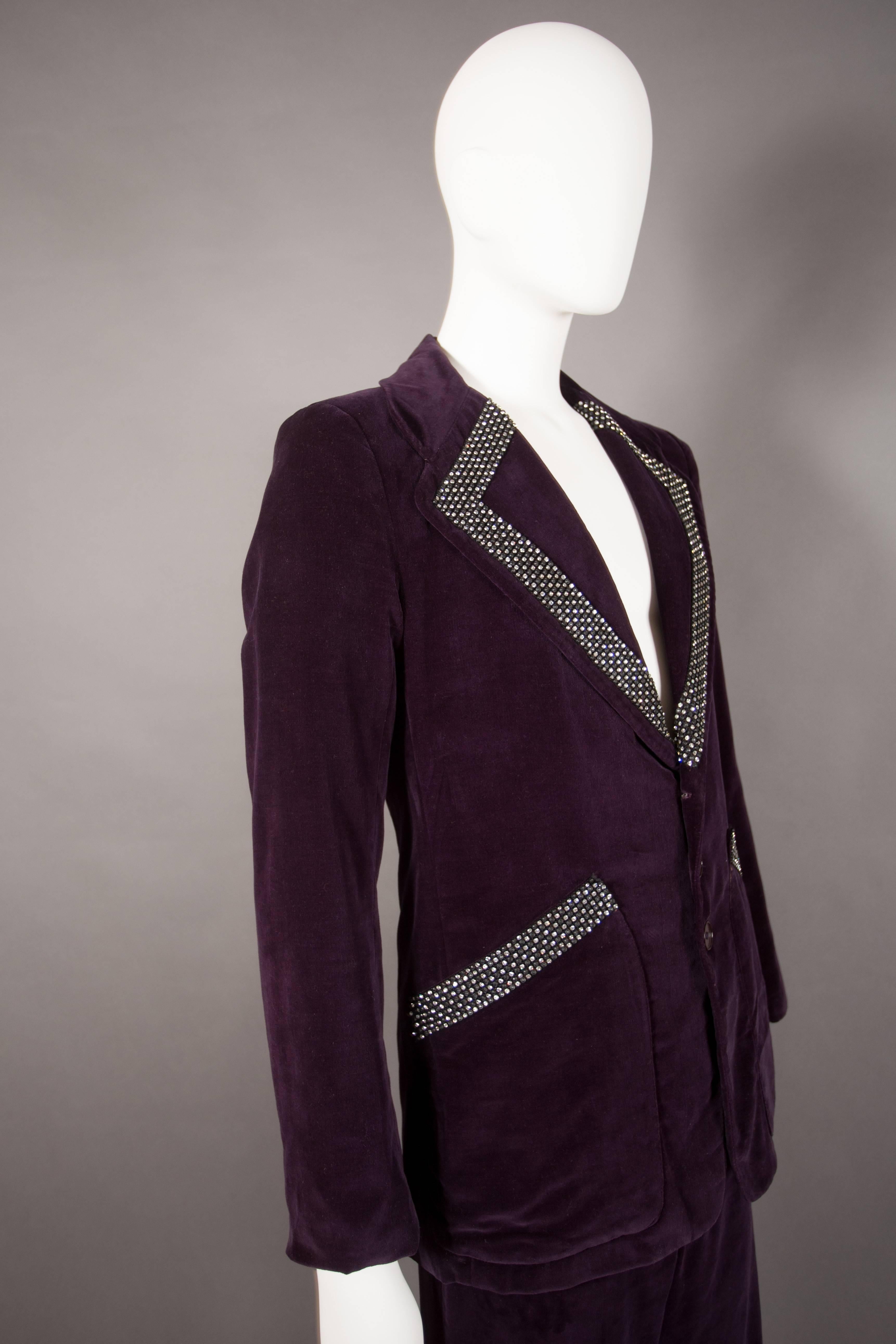 MR FREEDOM purple velvet suit, circa 1969. Rhinestone trim on lapels and front pockets, silk lining, three button closure and flared pants. 

'In 1969 Tommy Roberts moved to 430 Kings Road with Trevor Miles and launched a fashion and furniture