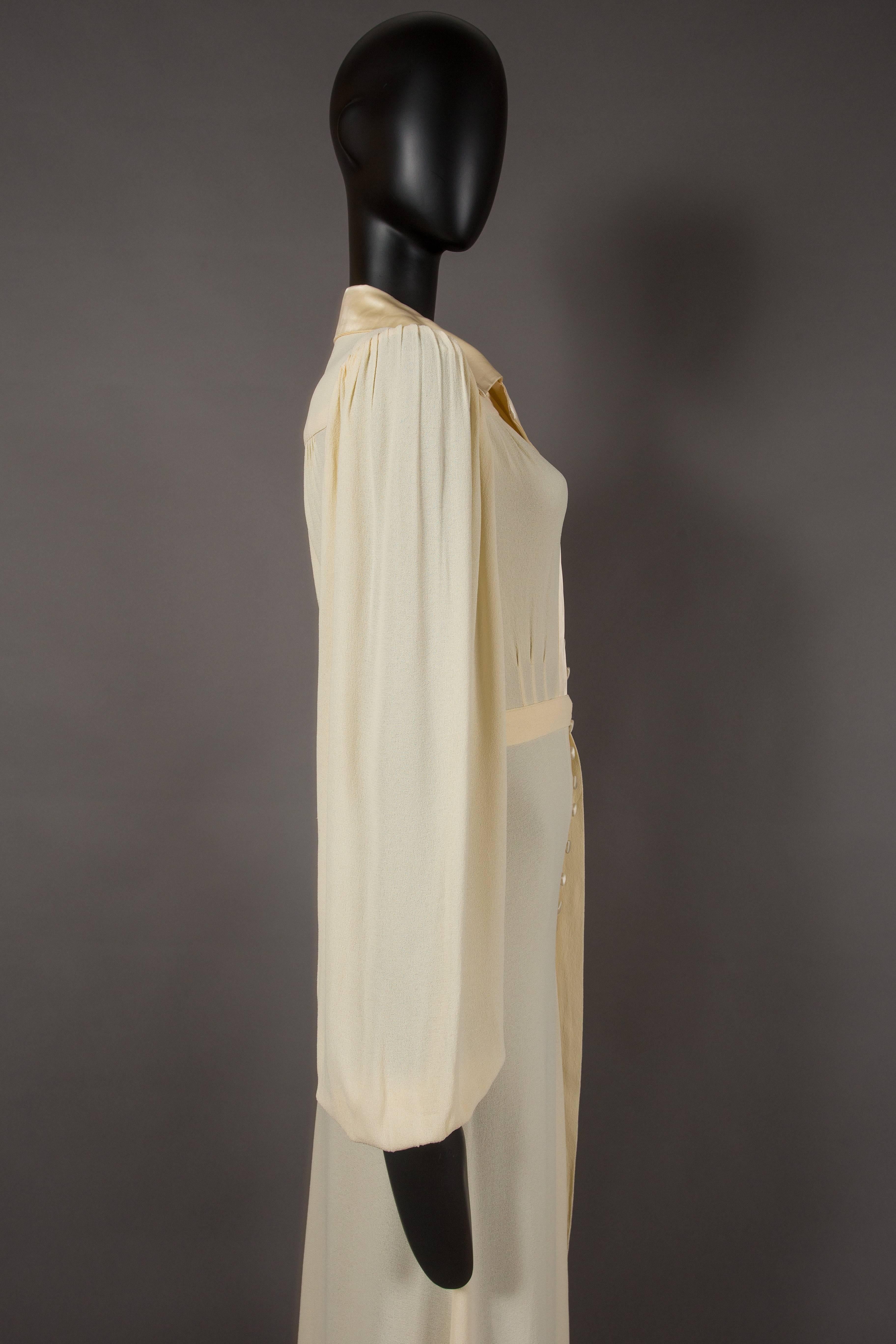 Women's Ossie Clark ivory moss crepe collared evening dress with satin trim, circa 1974