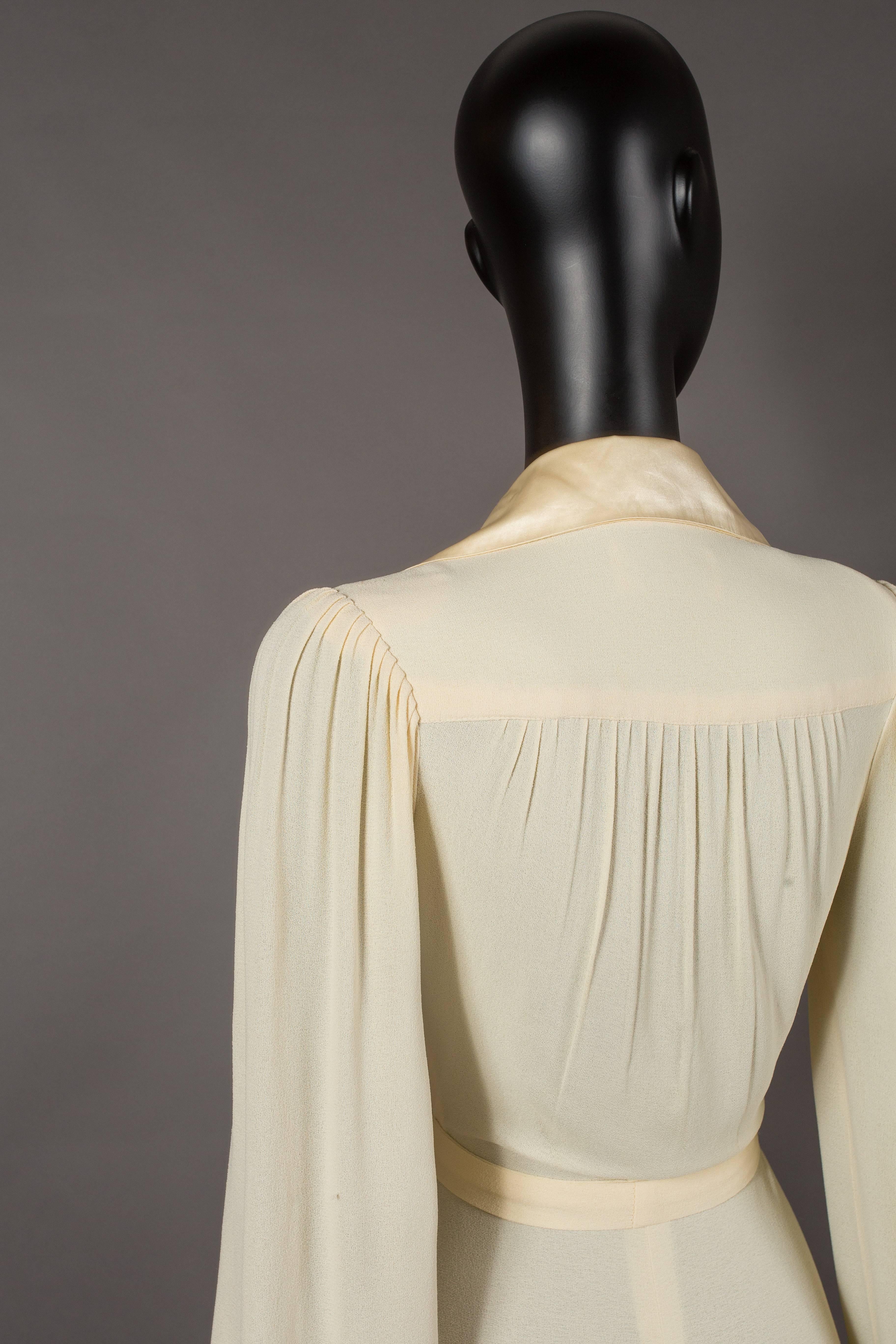 Ossie Clark ivory moss crepe collared evening dress with satin trim, circa 1974 1