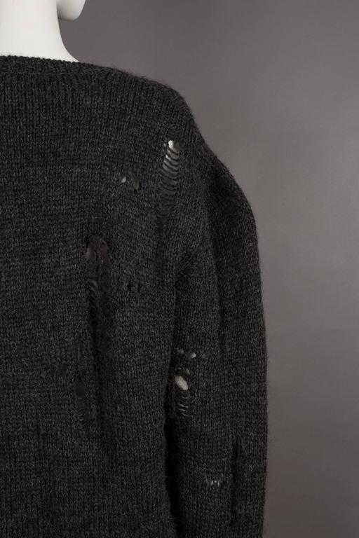 comme des garcons hole sweater