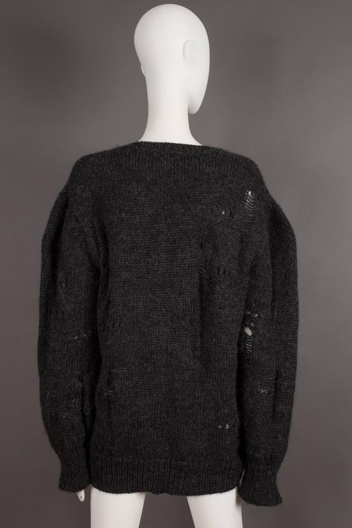 Comme des Garcons oversized sweater decorated with holes, circa
