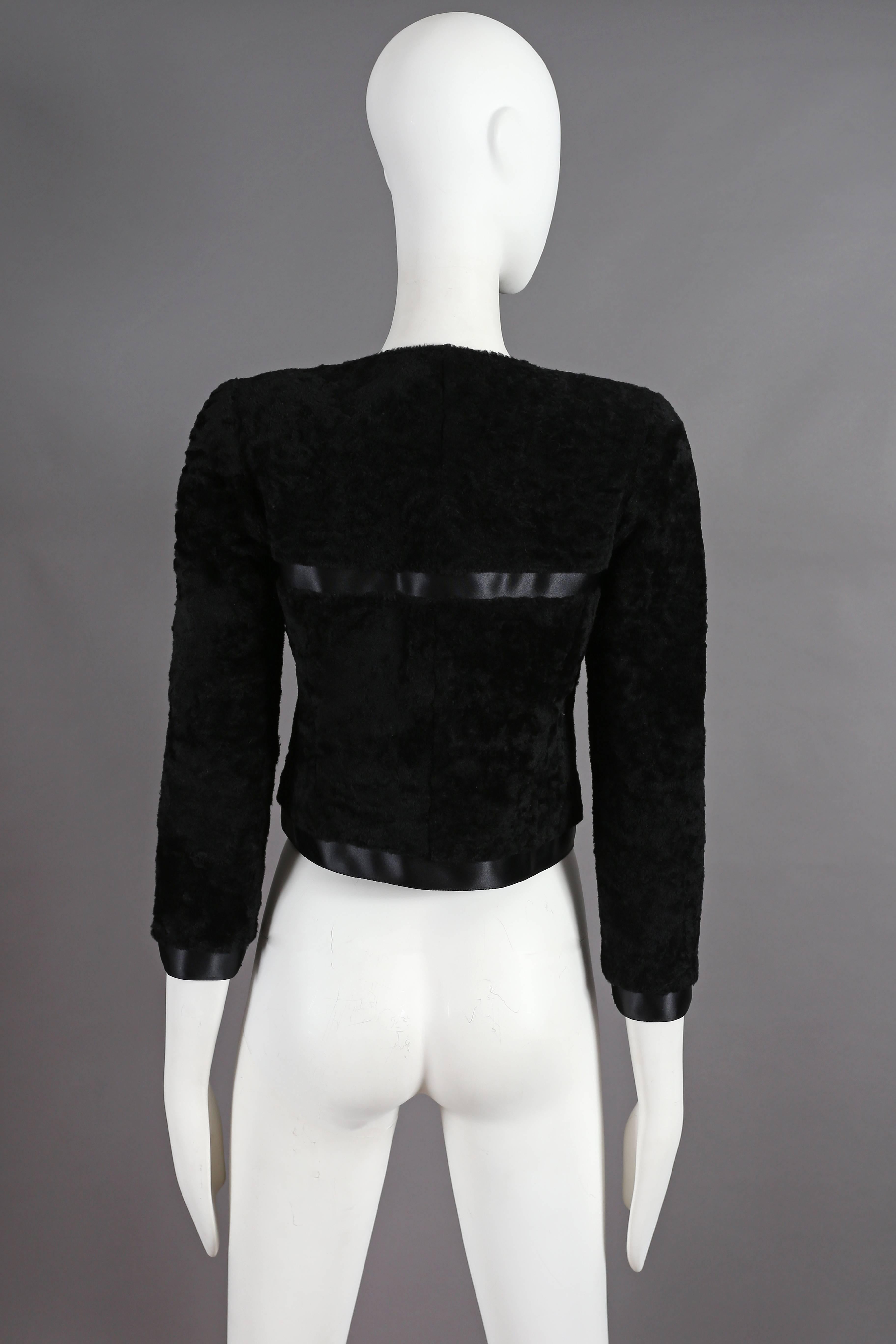 Women's Chanel black shearling cropped jacket with silk bow fastening, circa 2003