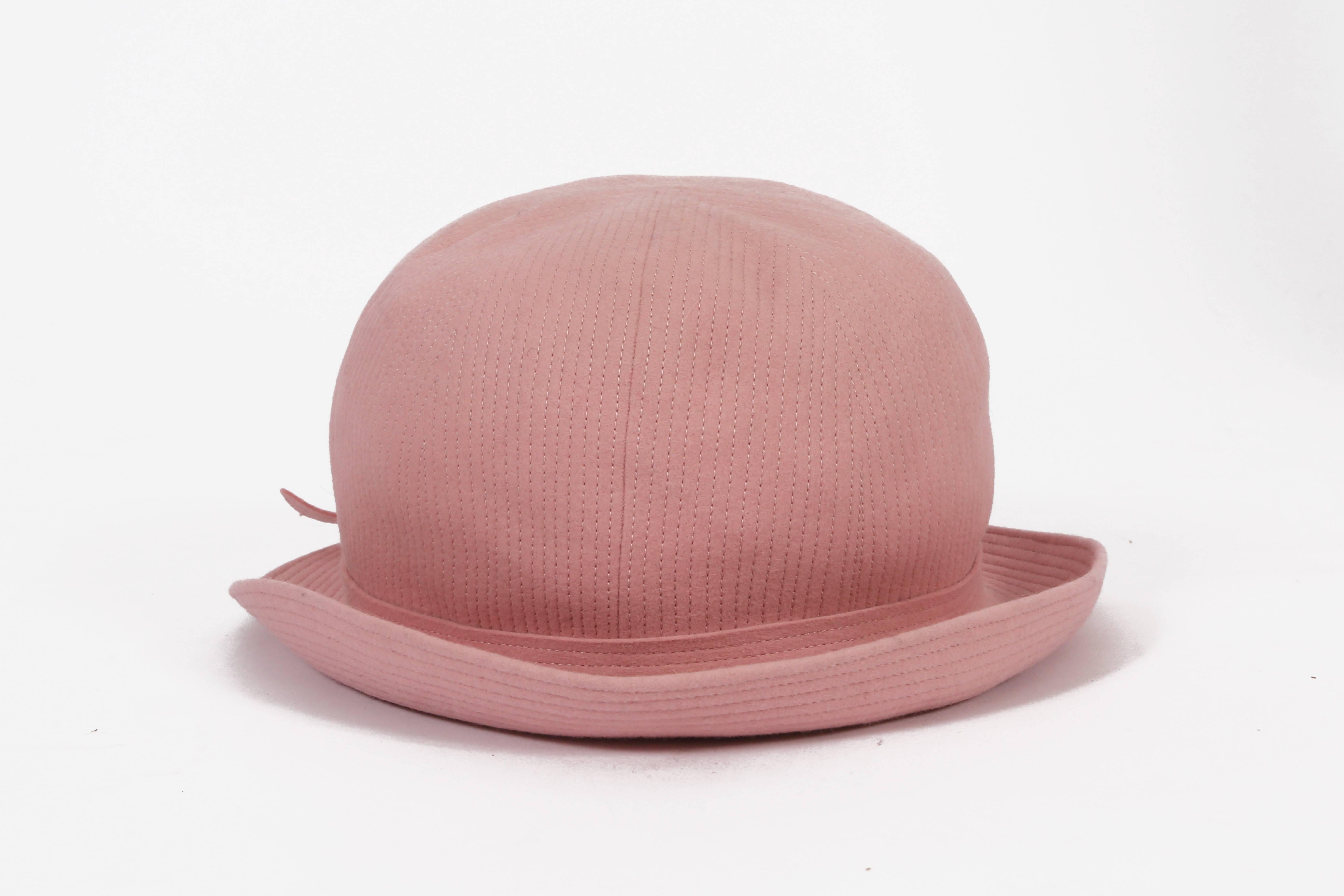Balenciaga Haute Couture baby pink bowler hat, circa 1961. As seen on the cover of Vogue, May 1961.
