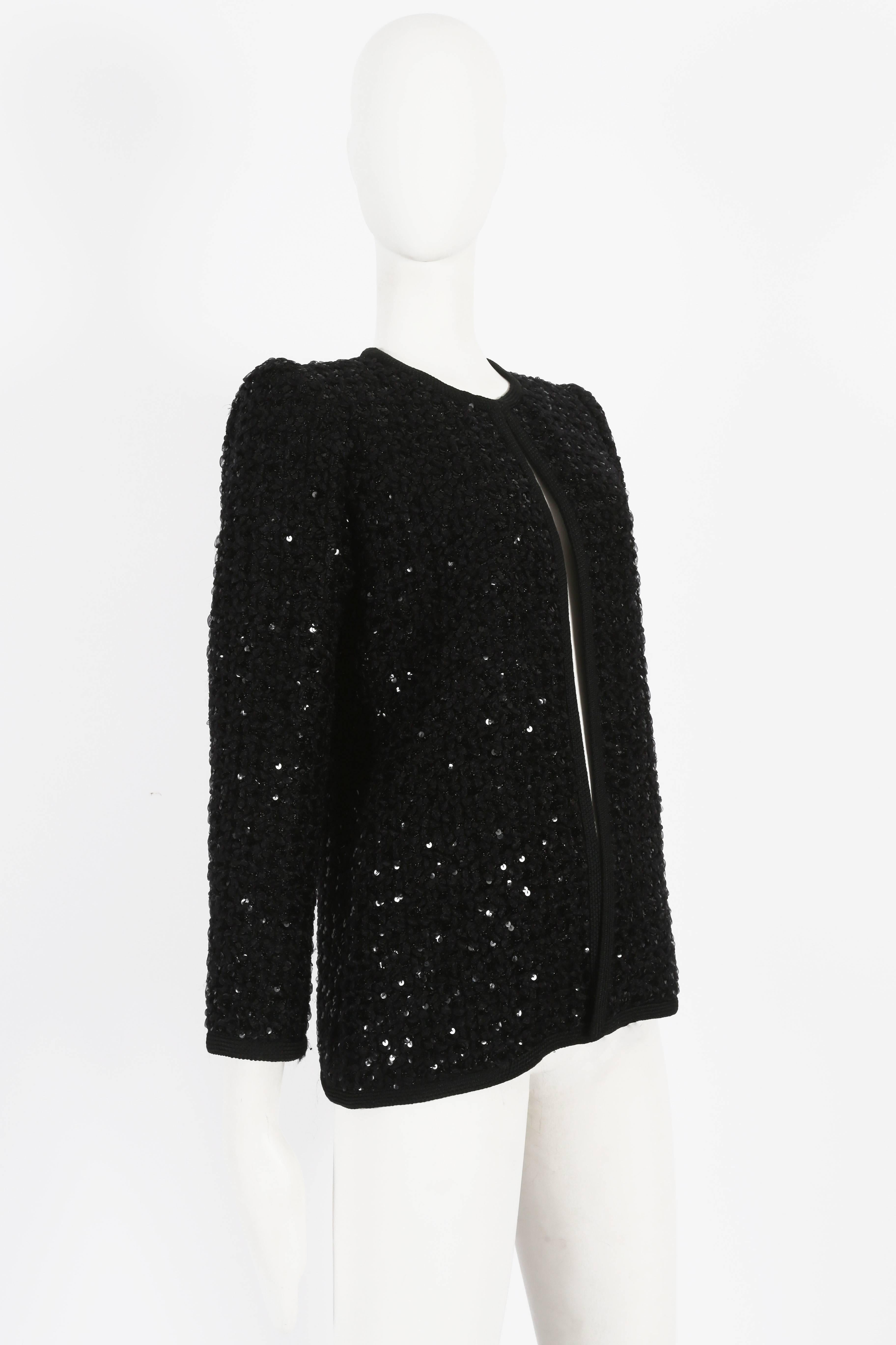 Presenting a Haute Couture Yves Saint Laurent evening jacket from the autumn-winter collection of 1978. This exquisite jacket is a testament to Yves Saint Laurent's legendary artistry and sophistication.

Adorned with black sequins throughout, the