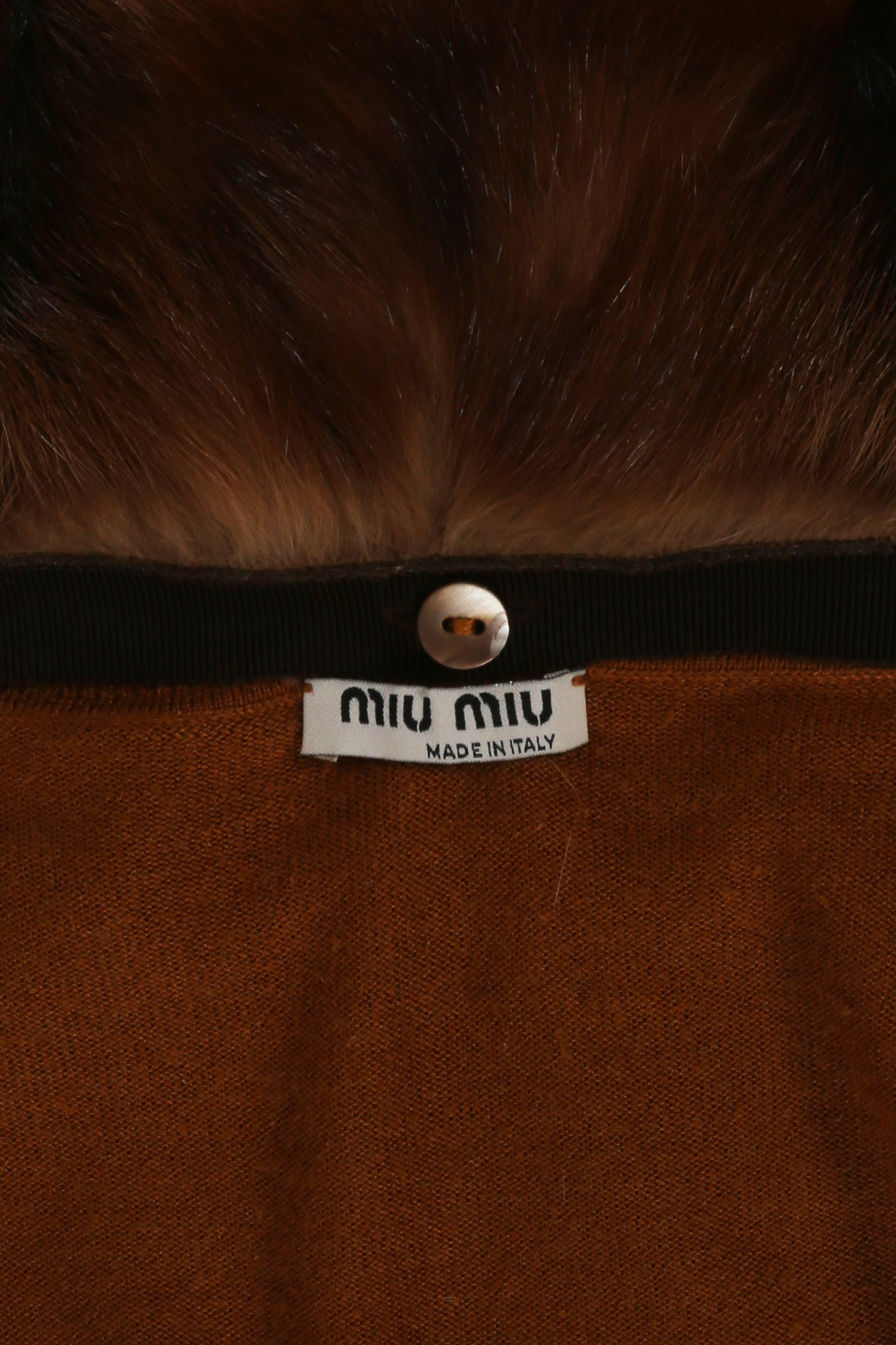 Women's Miu Miu cashmere cardigan with fur collar, circa 2004