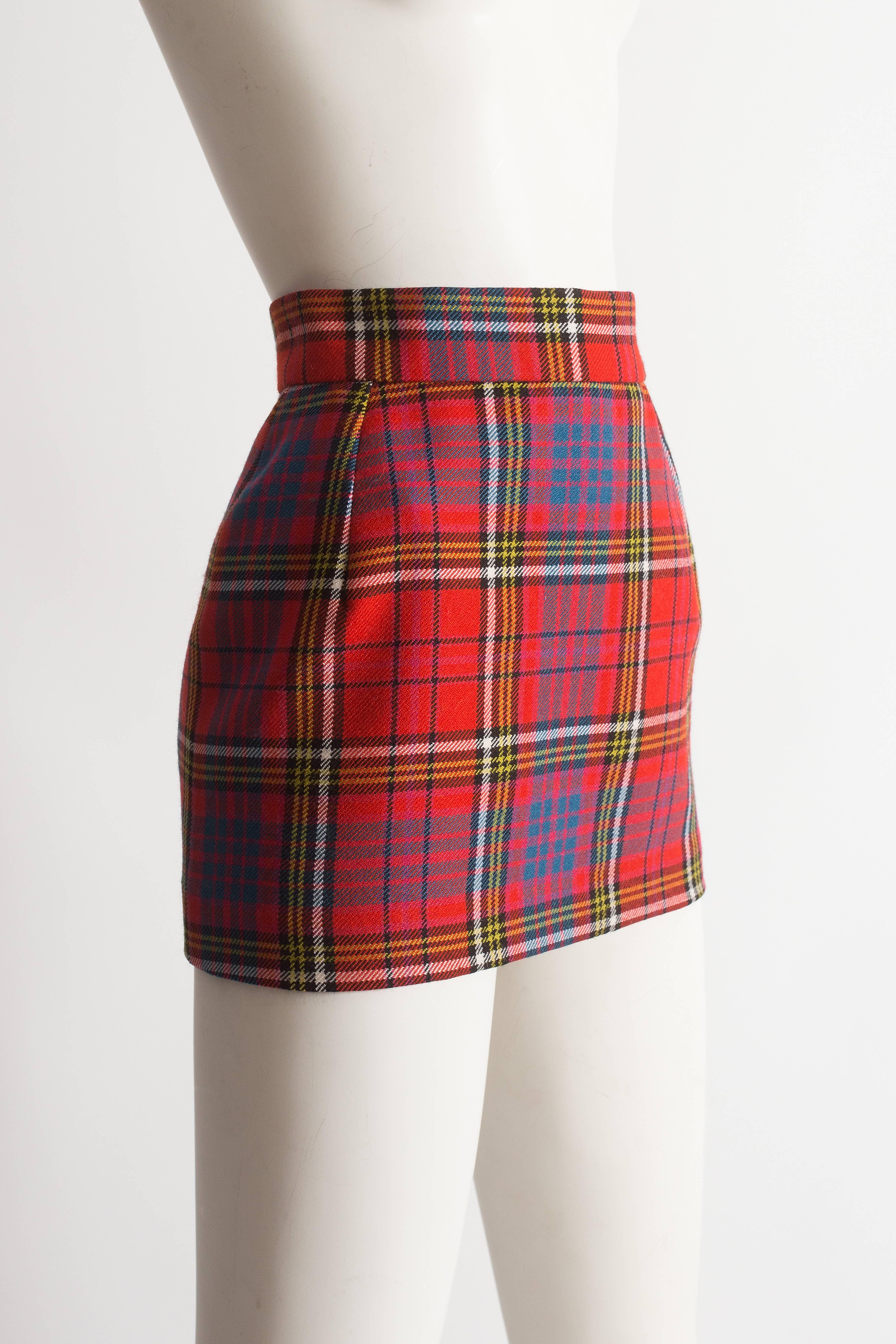 Rare Vivienne Westwood tartan wool mini skirt, Autumn-Winter 1993. Zip closure, satin lining and gold orb button closure.