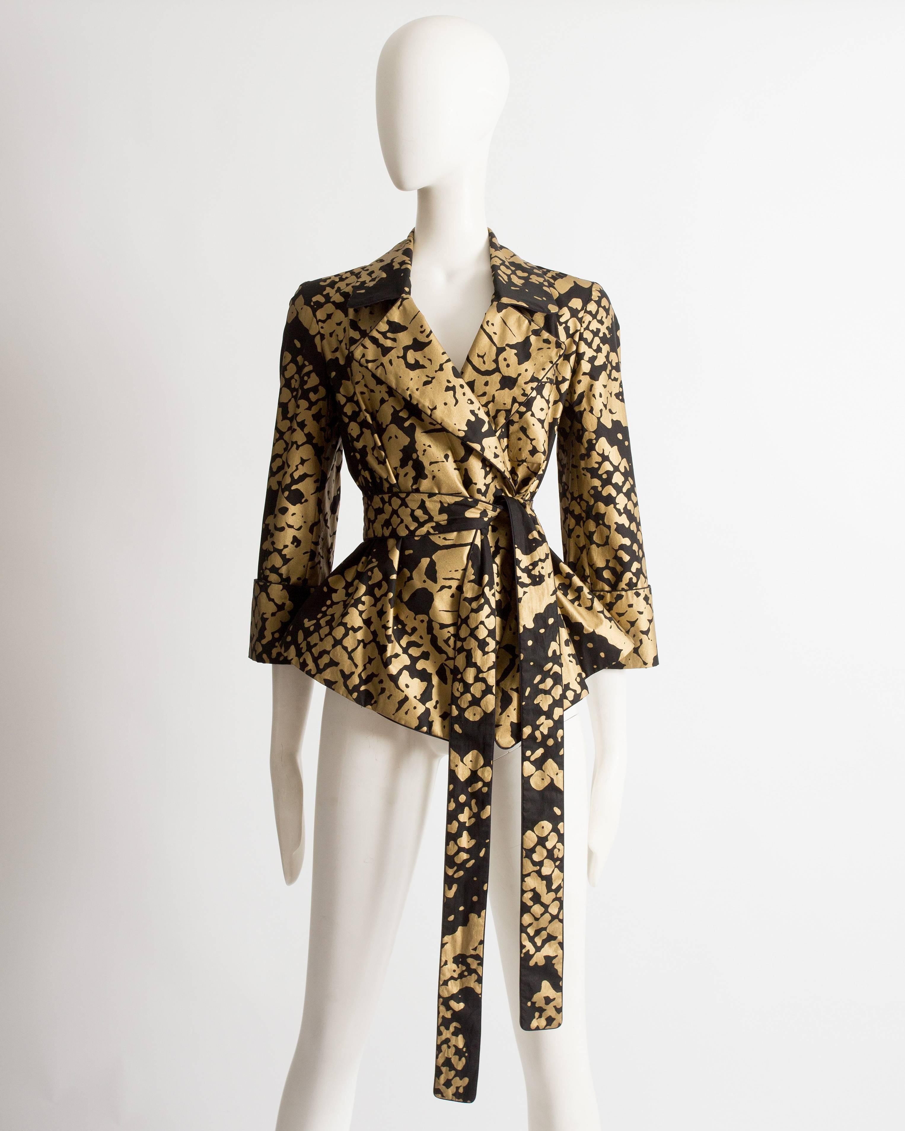 Yves Saint Laurent by Stefano Pilati black evening jacket with gold abstract print and extra long waist belt.

Circa 2008