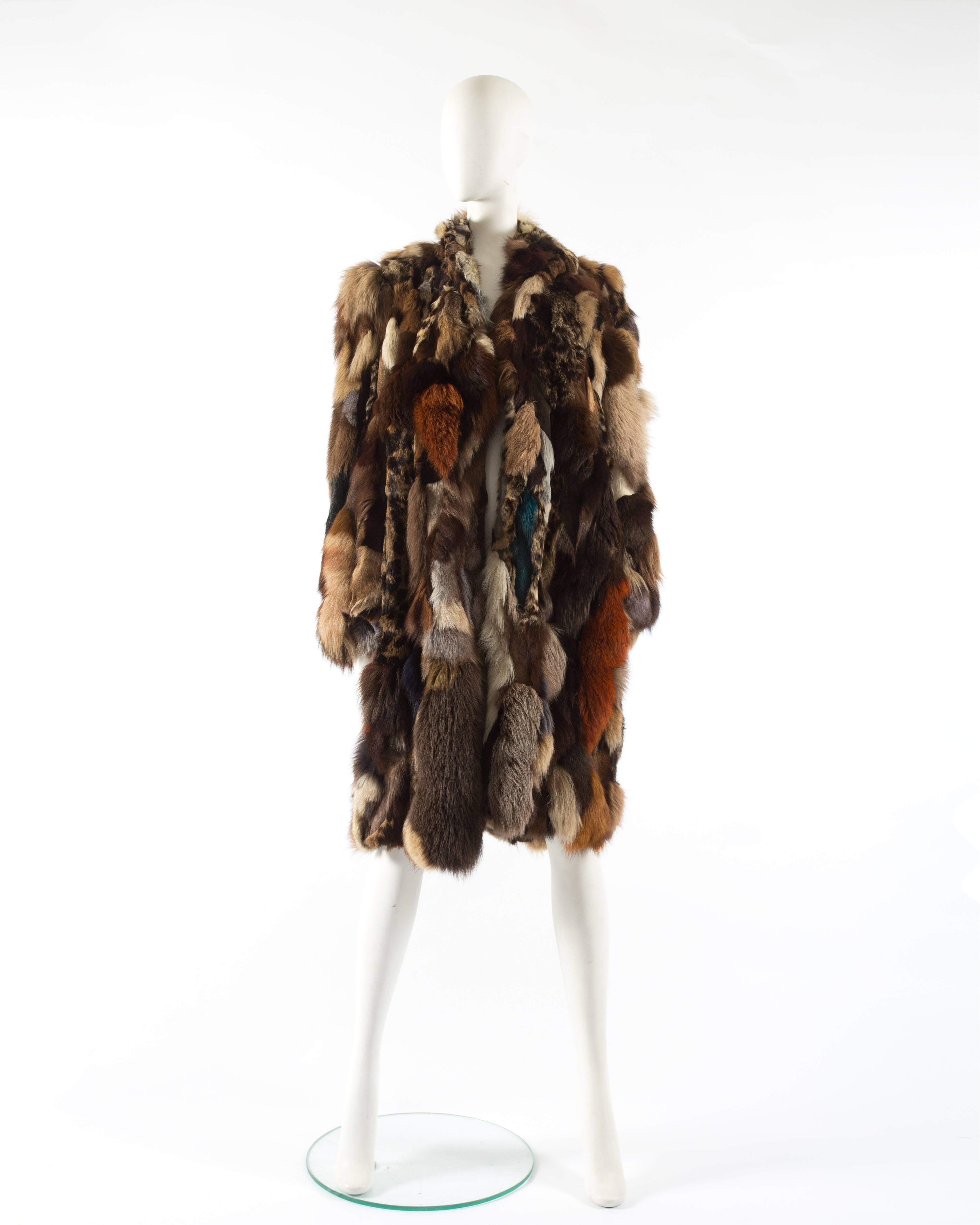 Patchwork fur coat by 'Octopus', circa 1970s. Oversized style, fox and mink fur, various prints and colors throughout, two side pockets, hidden hook-and-eye closures at the front and novelty print lining. 