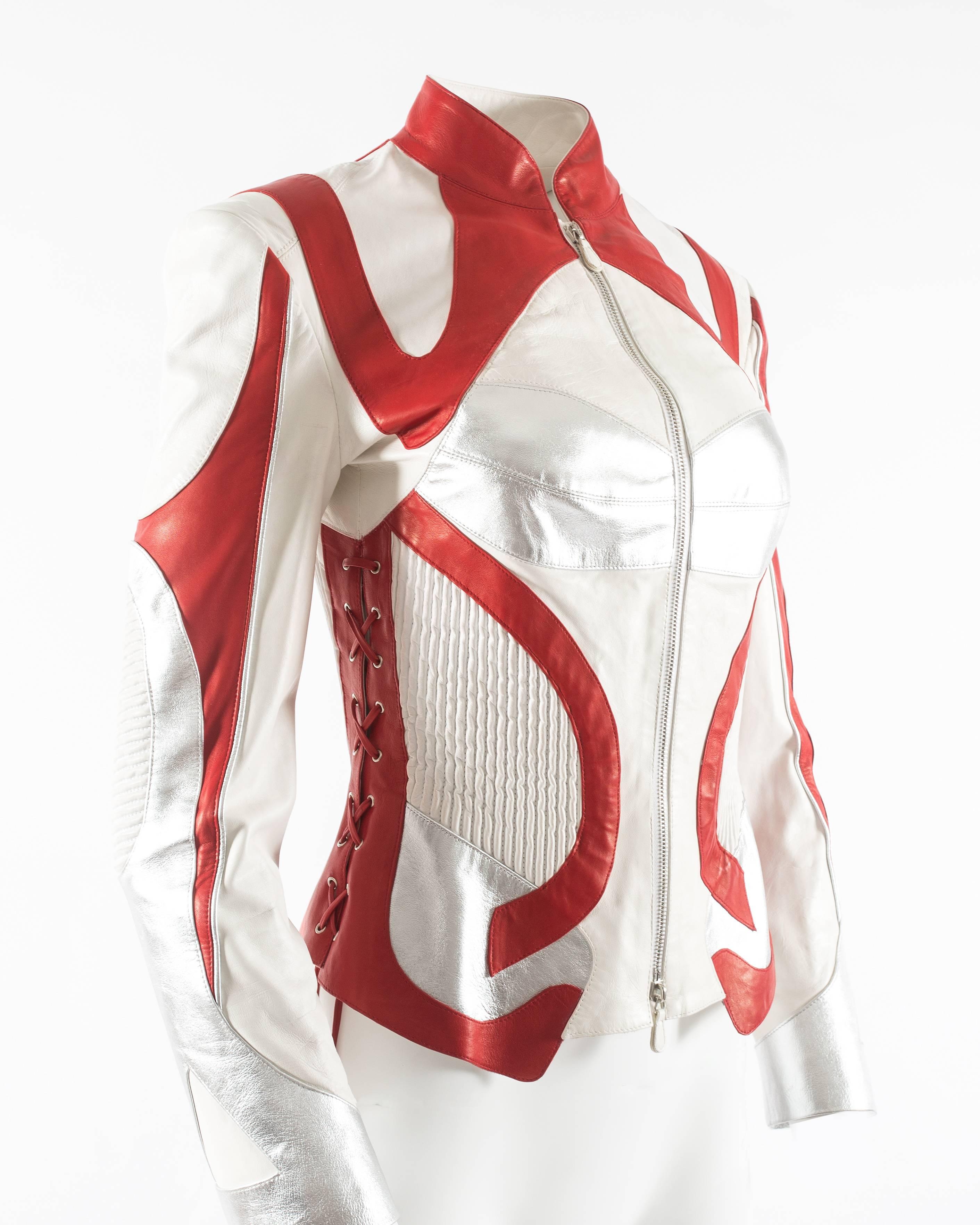 Alexander McQueen Autumn-Winter 2003 leather biker jacket

- White, silver and red leather
- lace up fastening on the sides
- metal zip closure at the front
- ribbed panels on waist
- 42% silk 58% polyester lining 