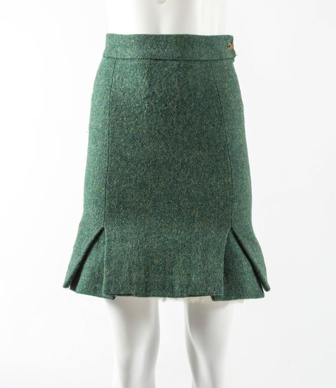Vivienne Westwood Autumn-Winter 1991 green tweed mini skirt with white tulle crinoline at the front with broderie anglaise trim.  