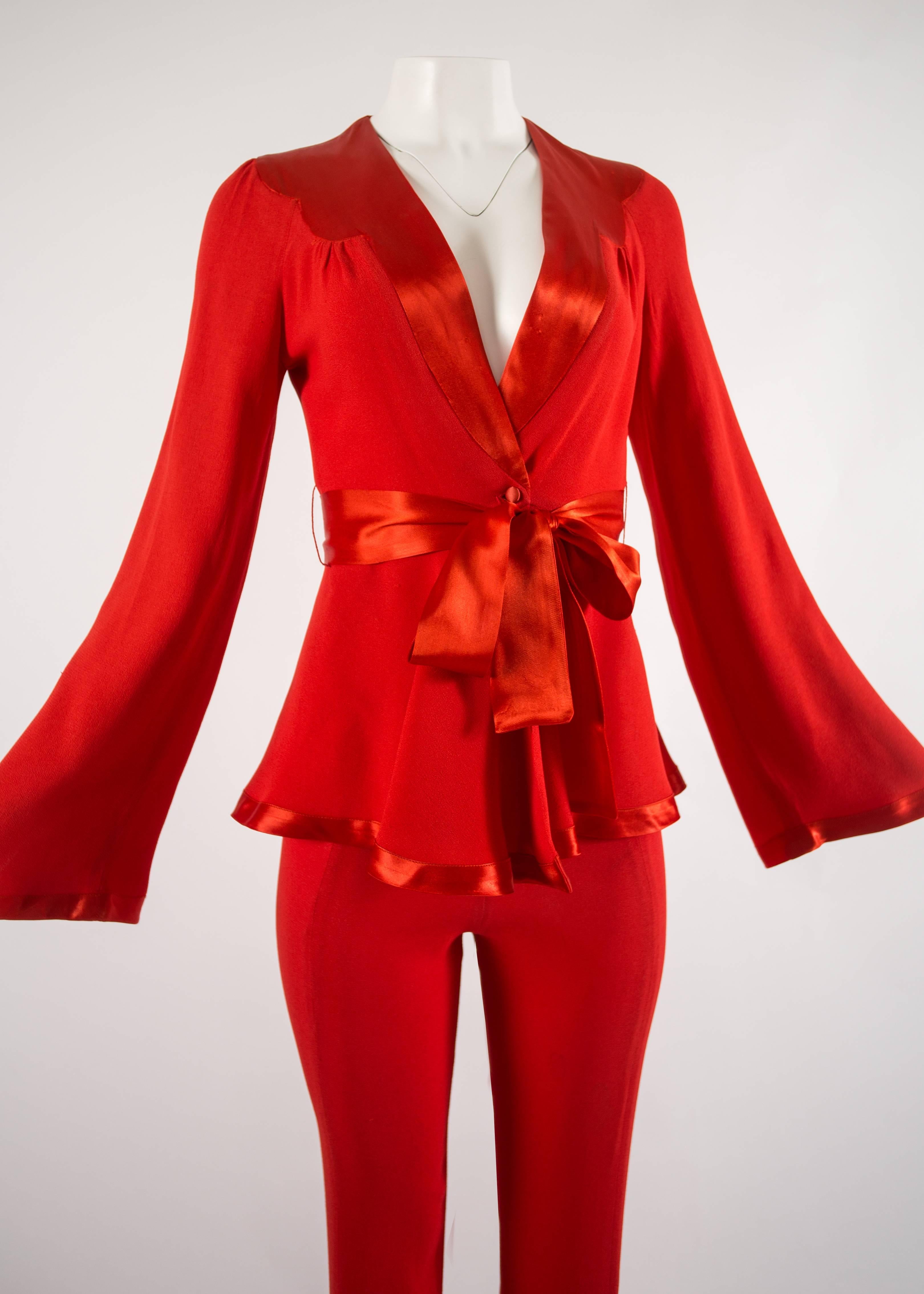 Ossie Clark 1970s red moss crepe and satin pant suit

- high waist bell bottom pants 
- wrap blouse with bell sleeves. satin ribbon belt and satin trim  