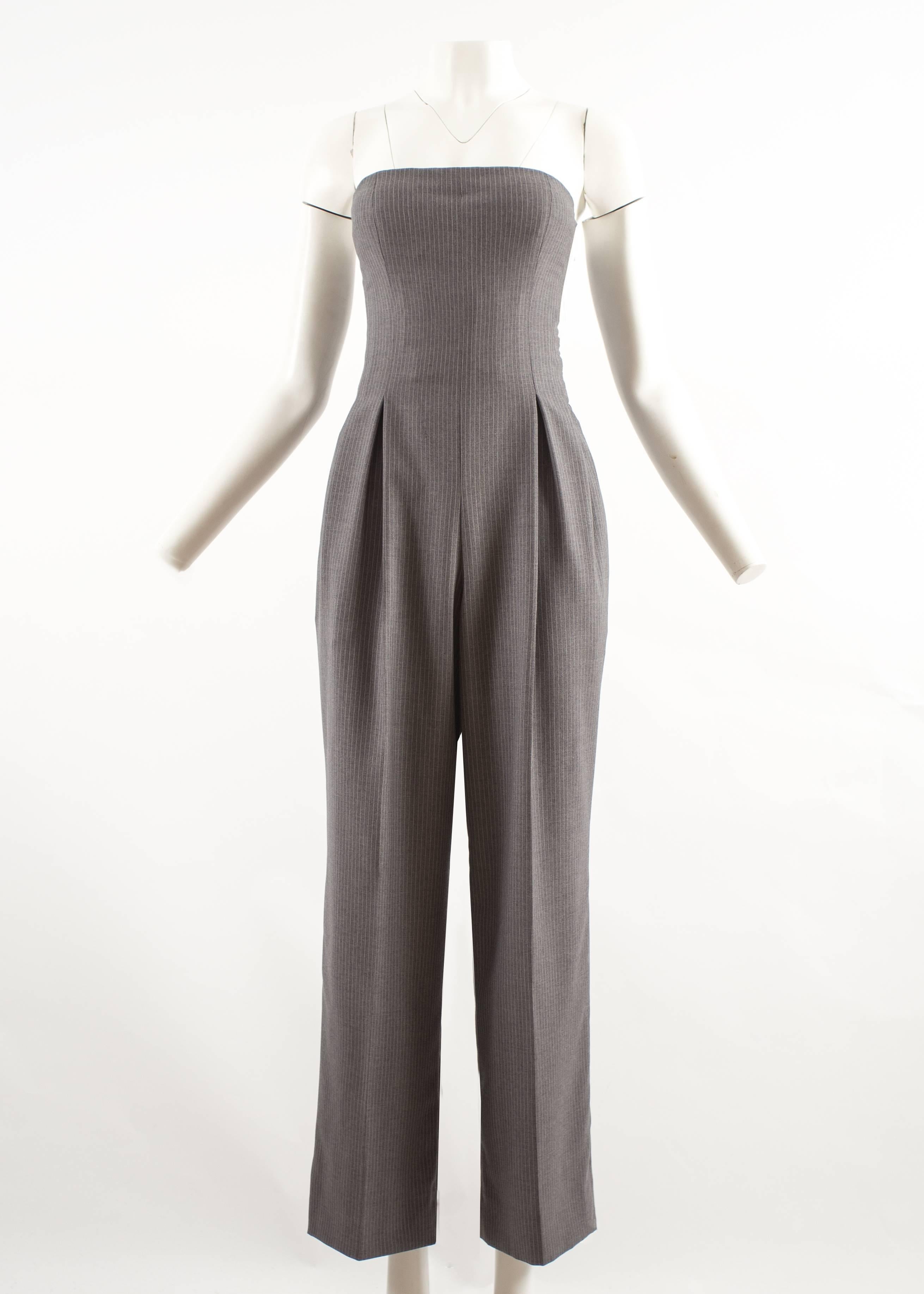 John Galliano for Givenchy Autumn-Winter 1996 grey pinstripe strapless jumpsuit 

- two hidden side pockets
- internal wired bra
- invisible zip fastening on side seam
- wide leg pants