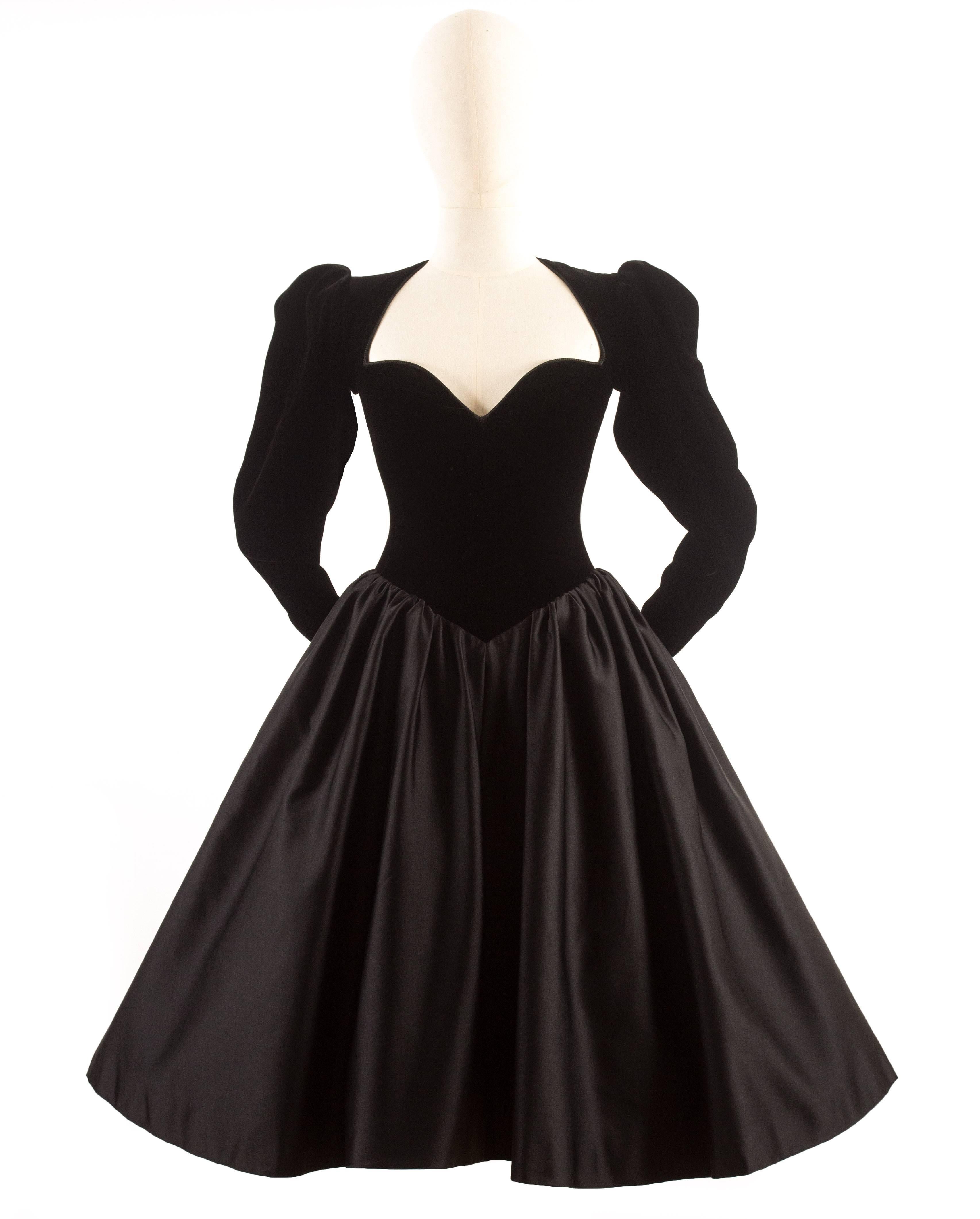 Yves Saint Laurent Haute Couture Autumn-Winter 1981 black velvet cocktail dress with ample pleated skirt of silk satin. 