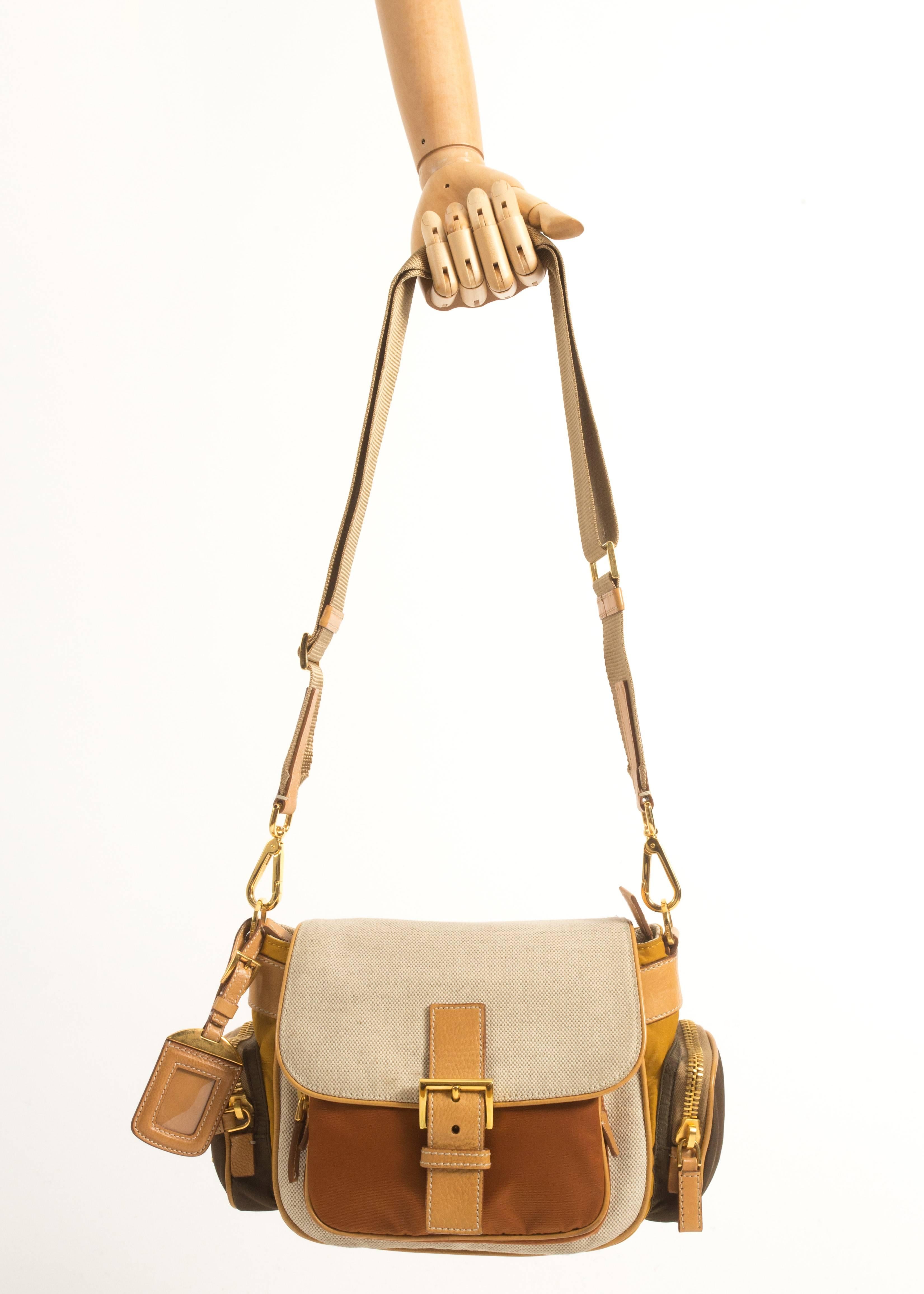 Prada leather, canvas and nylon crossbody bag with adjustable shoulder strap, gold hardware and zip closures