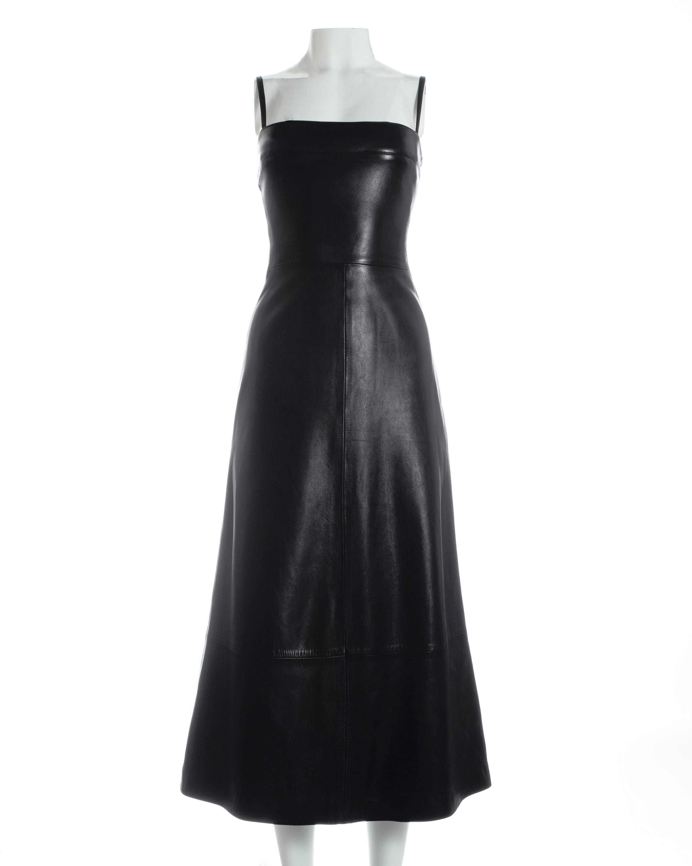 - Buttery soft black lambskin leather 
- Thin spaghetti straps
- Fully lined 
- Zip fastening 
- Fitted bust and waist
- A-line skirt finishing at the ankles 

Ca. 1998