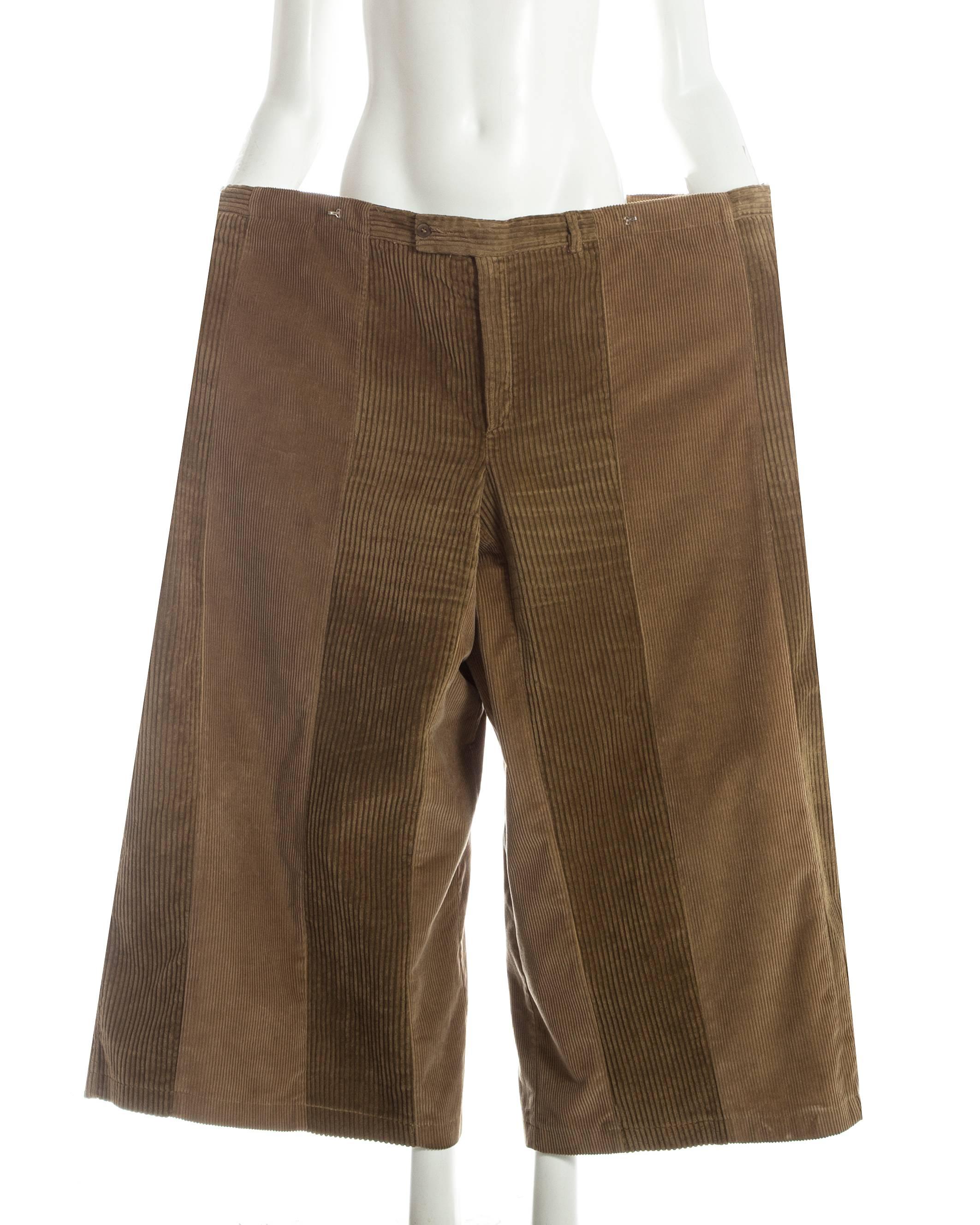 - XXXXL laid flat 
- metal hook-and-eye closures and a belt button fastening inside allow the wear to manipulate the size 
- can be styled in multiple ways 
- made from two pairs of vintage corduroy pants 
- collectors item

ca. 2000-3