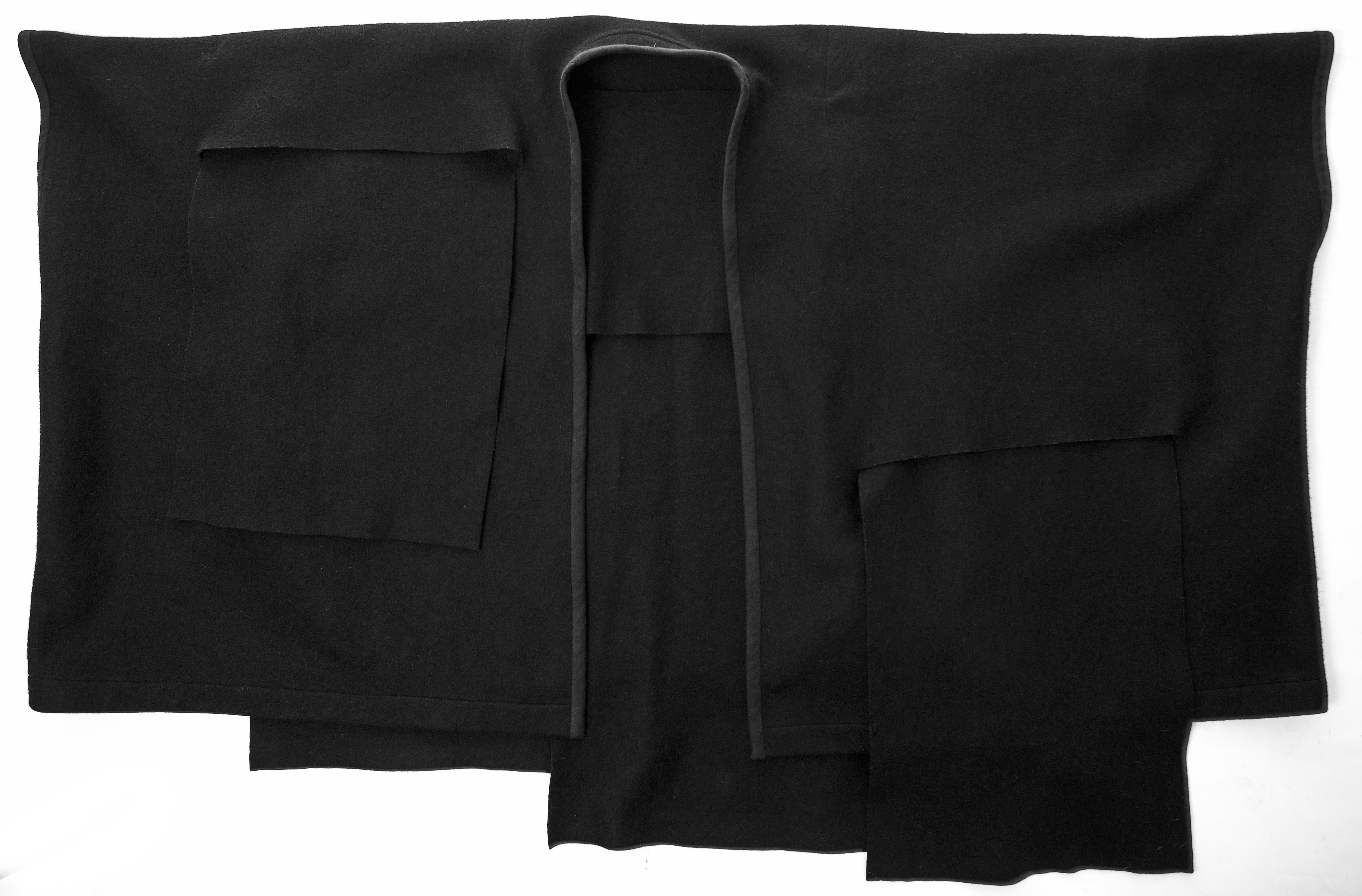 Comme des Garcons black wool coat constructed from large woven panels, AW 1983 3