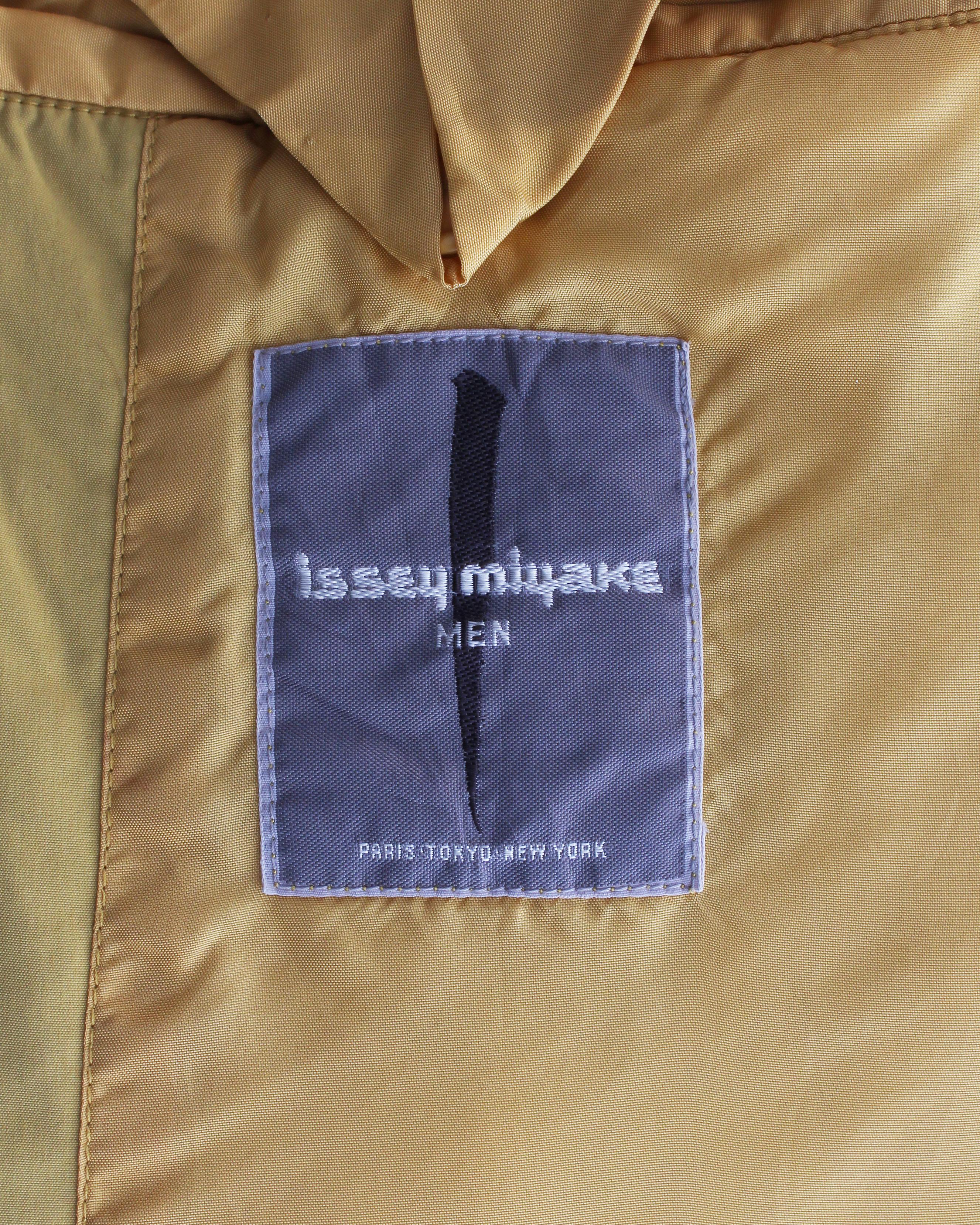 Issey Miyake men's mustard nylon puffer coat, ca. 1980s 1