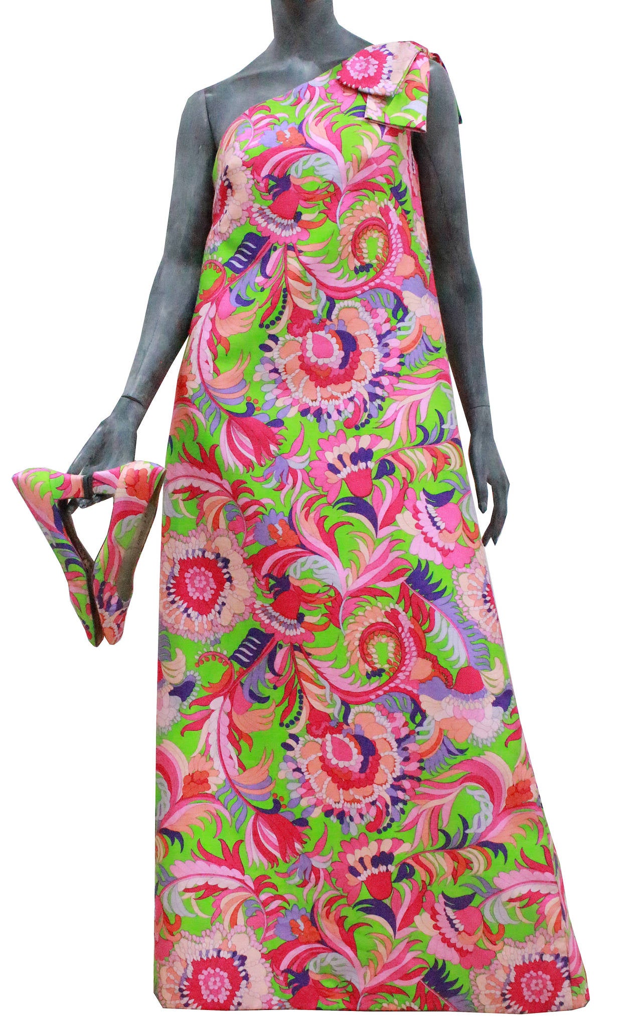 From 1958 to 1960 Bohan designed for the Christian Dior, London line. This dress is a great example of the beginning of a decade which changed the history of fashion.

This A Line dress features a kaleidoscope of colours which together to create a