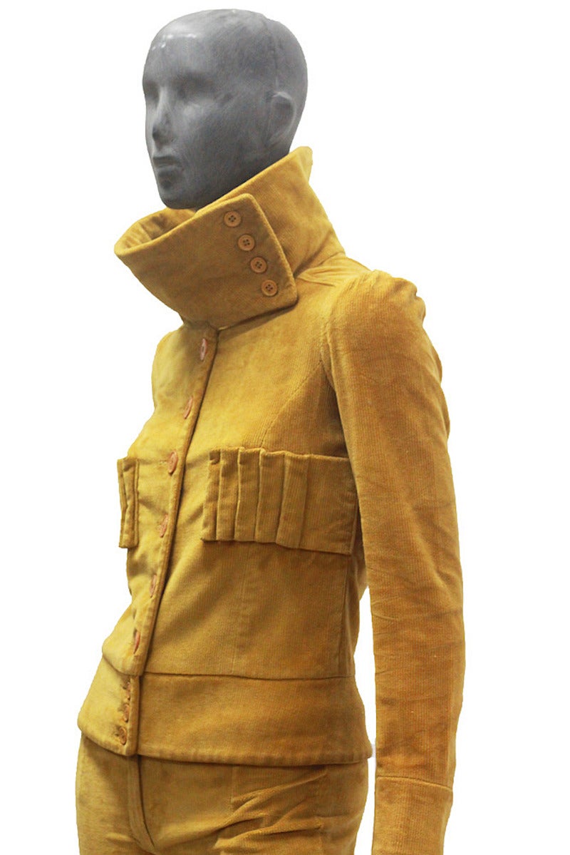 Super rar BIBA corduroy trouser suit circa 1968. The mustard suit has a high standing collar and is in immaculate condition. 

This ensemble was photographed by influential model turned photographer Sarah Moon for the BIBA campaign and catalogue