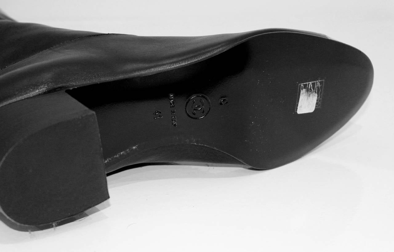 Chanel unworn and new cut out black boots, sz 41 2