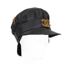 The iconic Chanel  leather and chain biker hat c. 1991