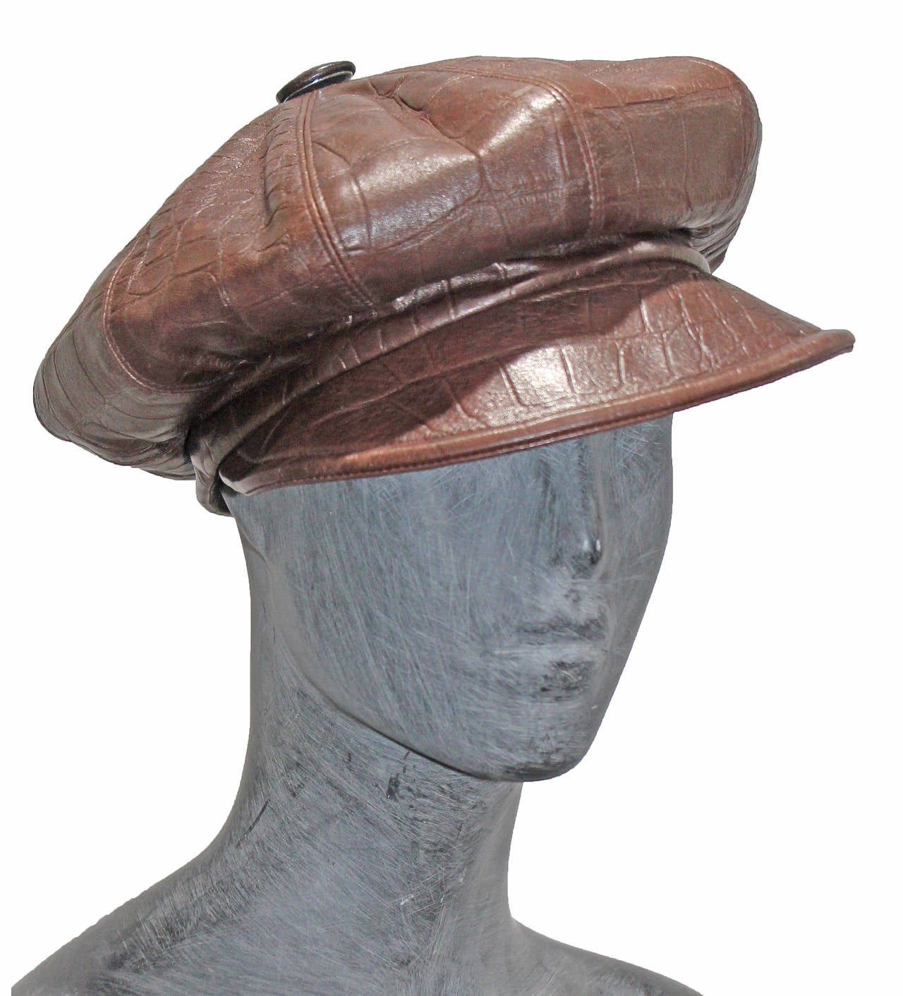 A 90s John Galliano for Dior brown leather newsboy hat with croc embossment. Silver Dior stamp at rear, monogram Dior logo lining, size 58.