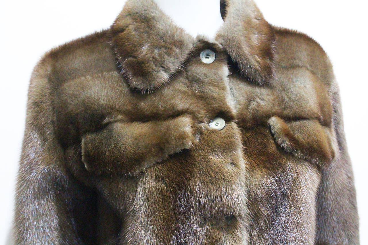 A 1998 Gucci brown mink fur trucker jacket with leather lining. 

Sizing: Italian 40 - UK 8 - US 4 - Fr 46