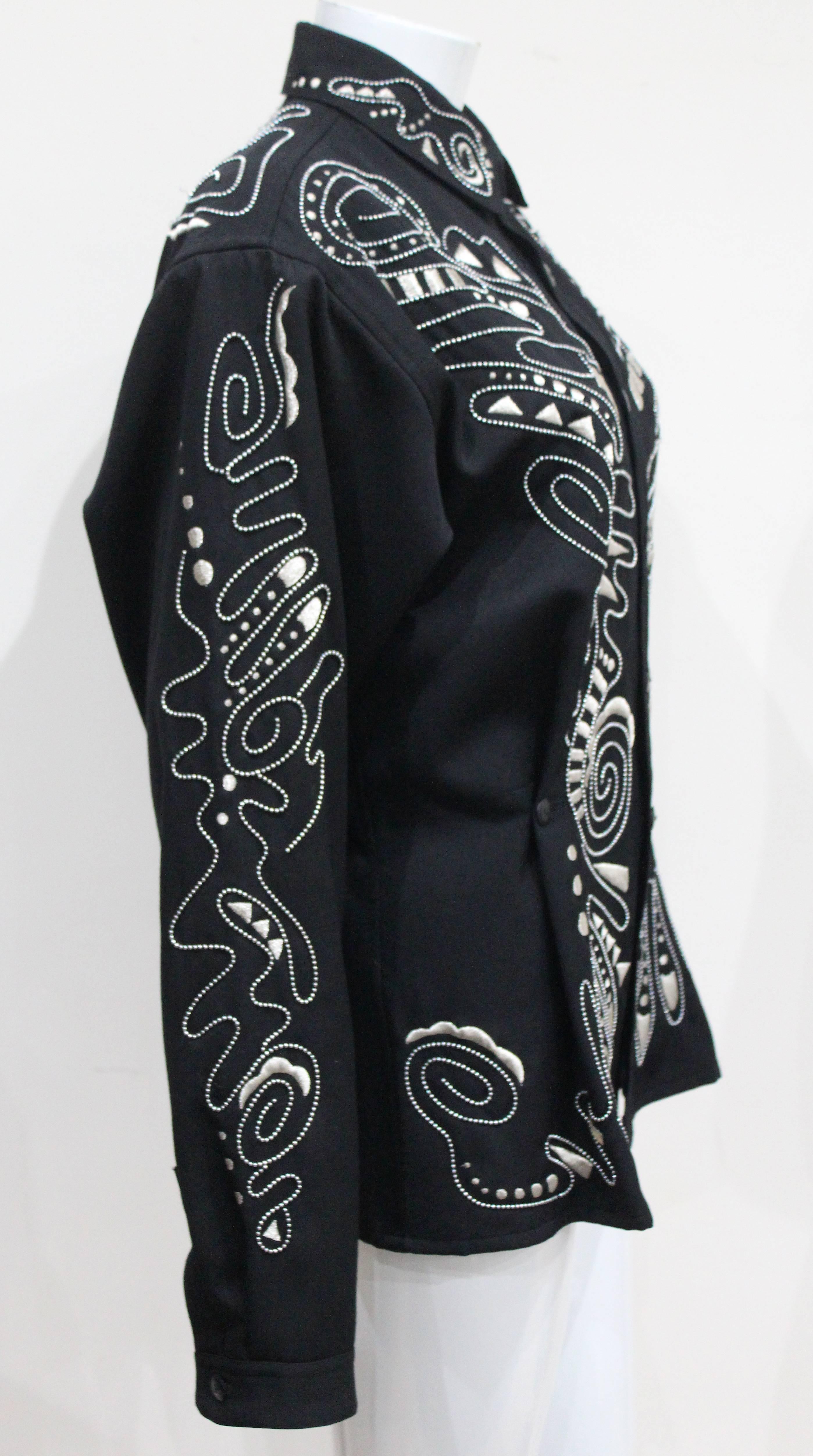 A rare Kansai Yamamoto black tailored jacket with silver embellishment throughout. 

Size: S/M