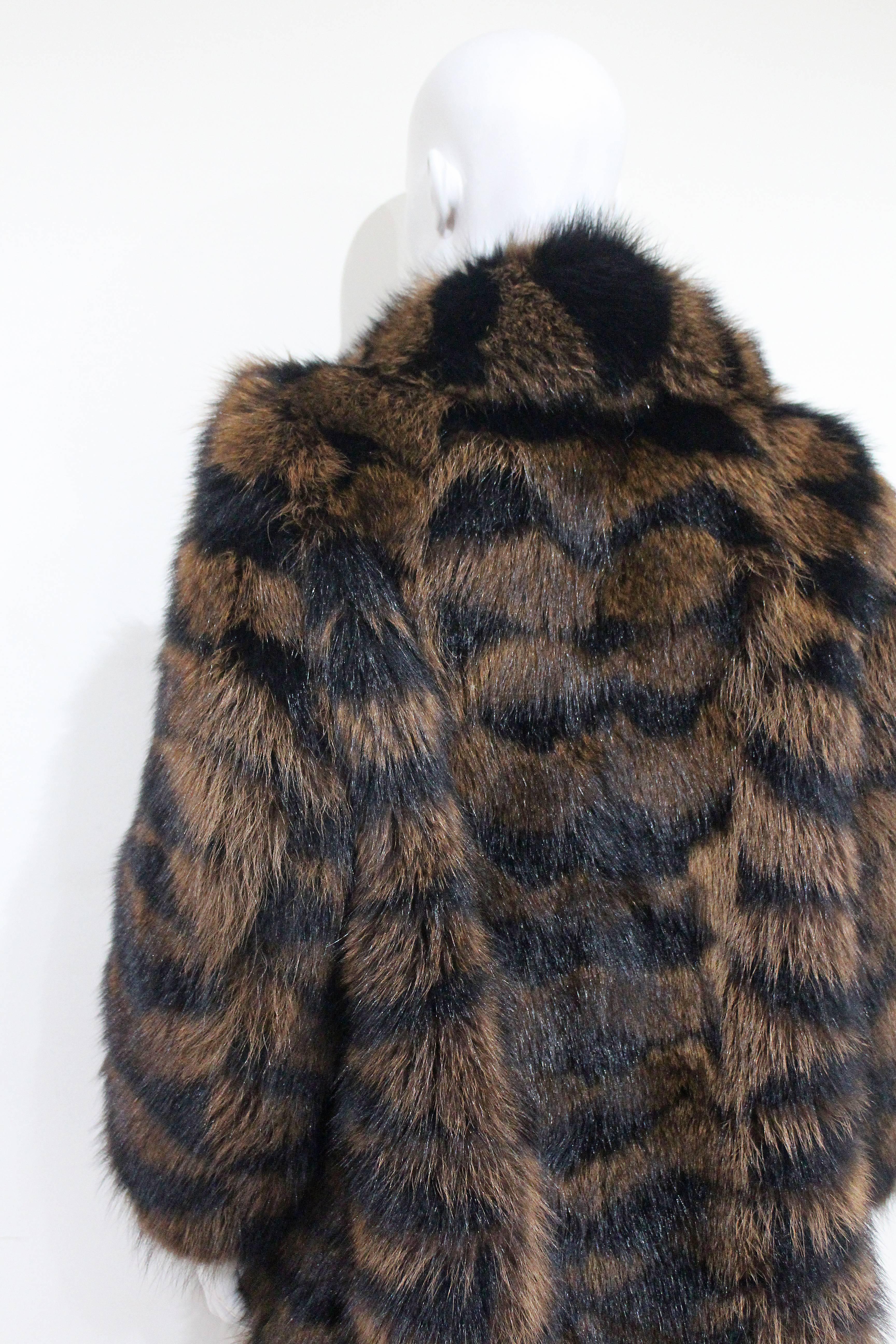 Donna Eccezionale cappotto di pelliccia di castoro di Yves Saint Laurent, anni '80 ca.